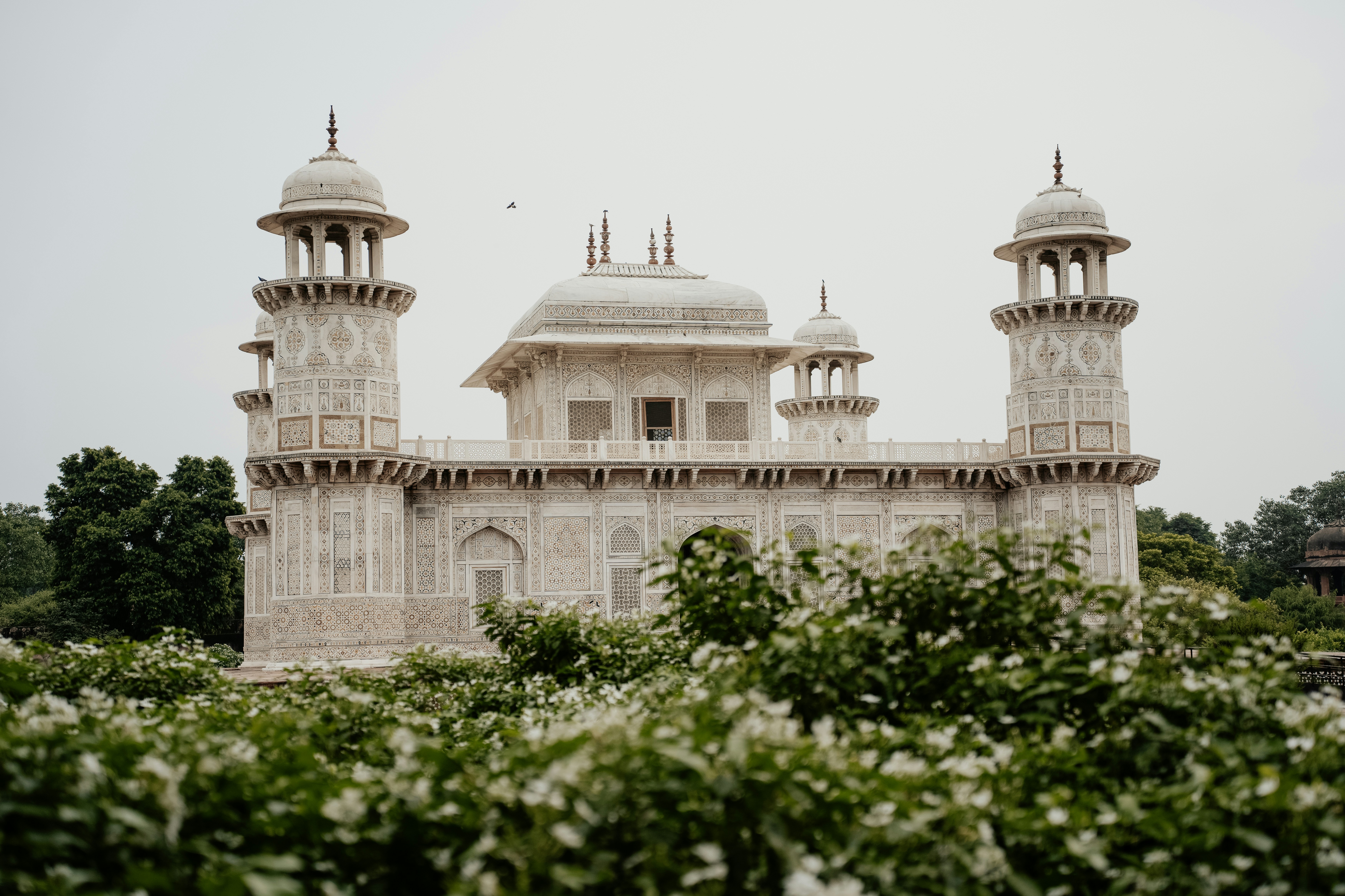 White marble mausoleum with flowers