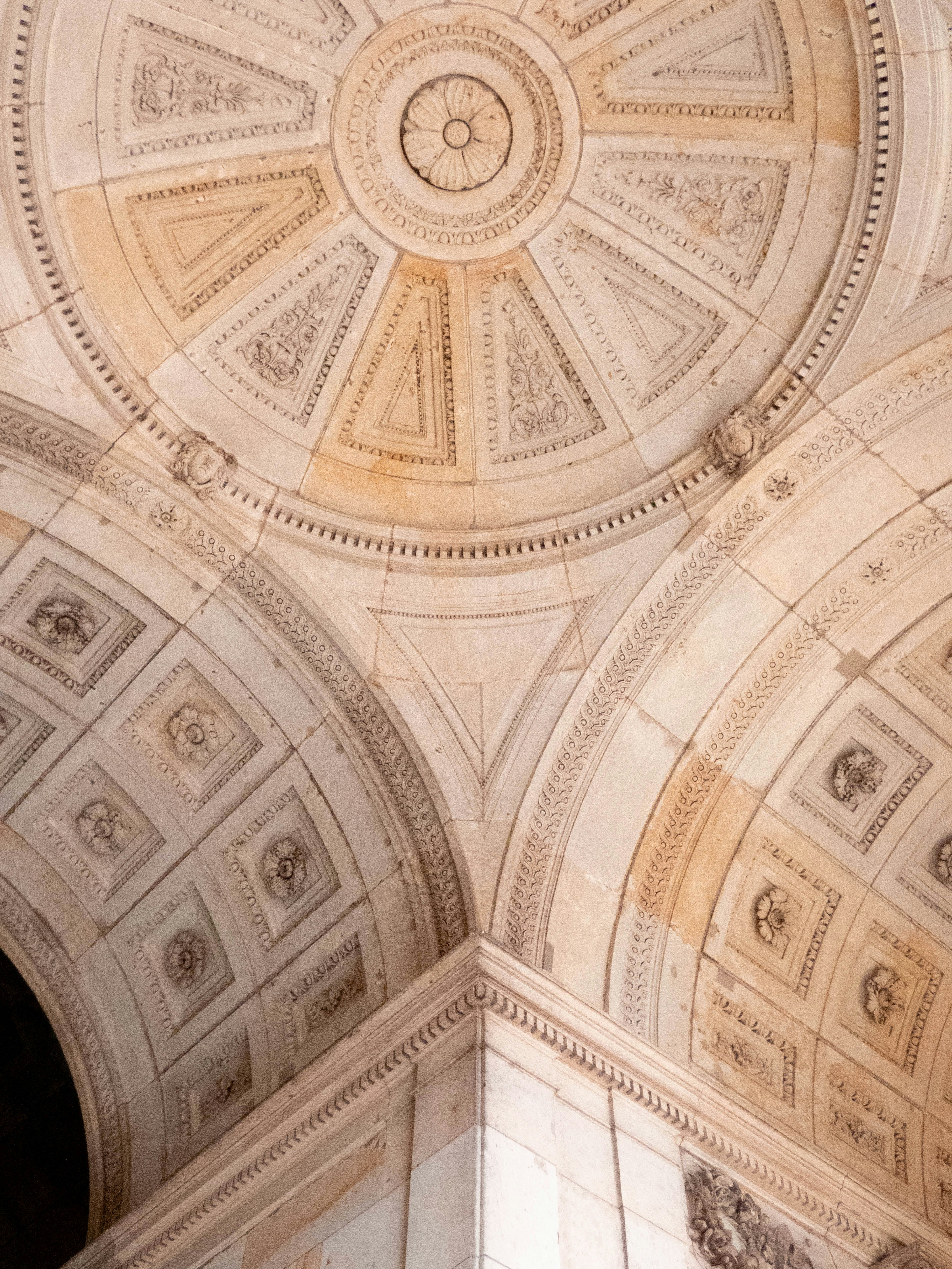 Intricate architectural details of a domed ceiling.