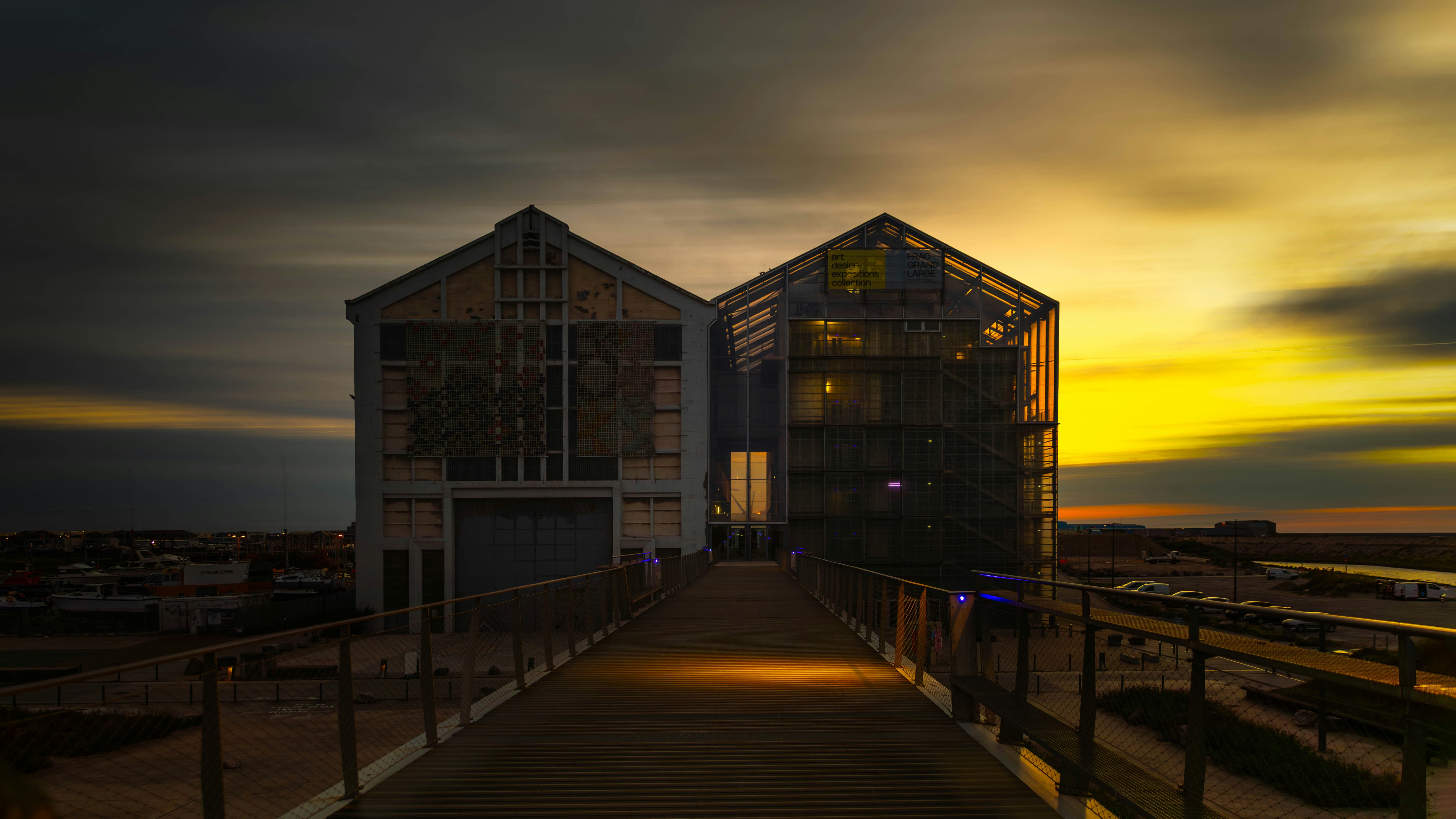 Modern buildings with glass facade at sunset