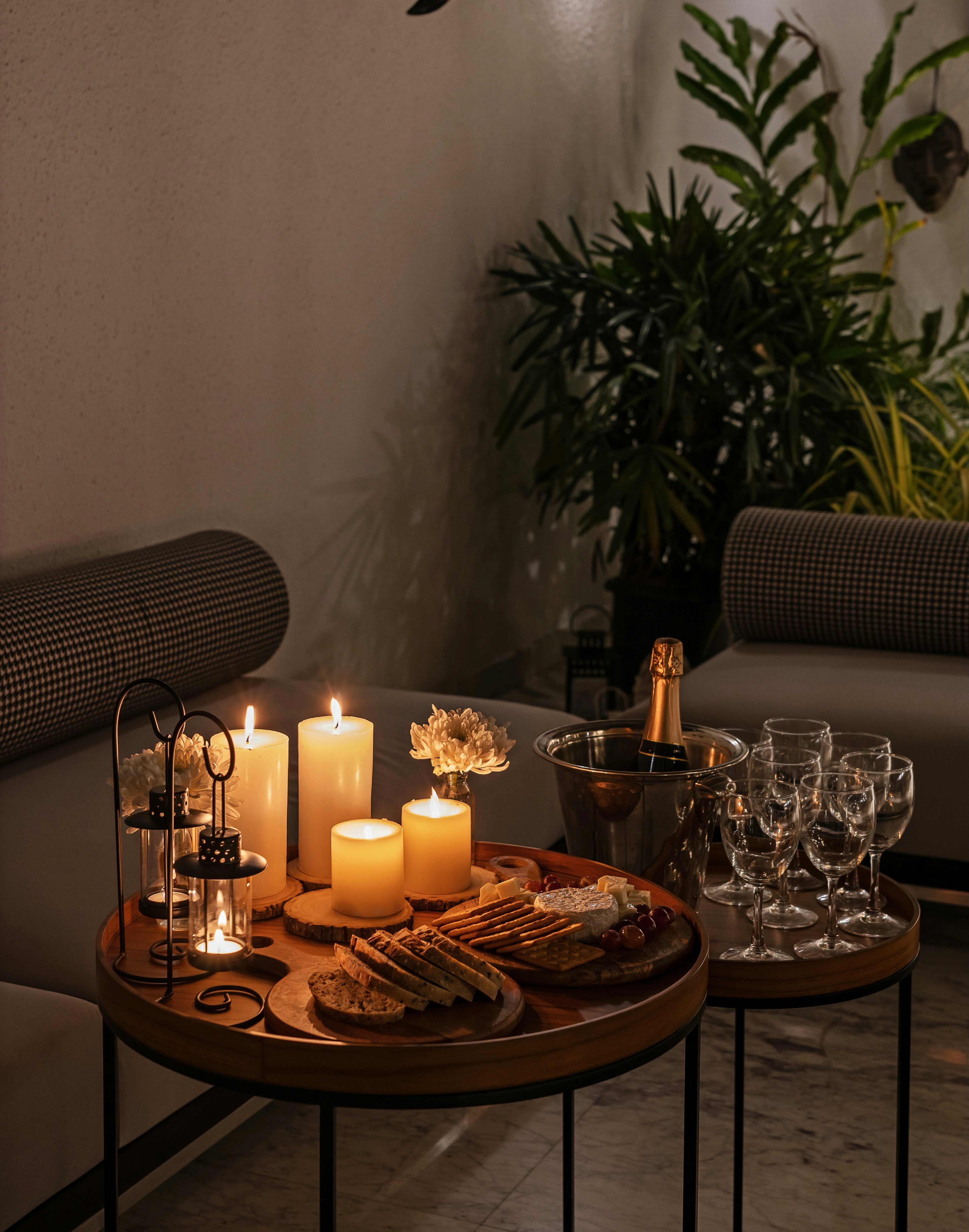 Candles and champagne set up for a romantic evening