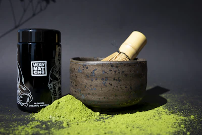 Matcha powder, bowl and whisk