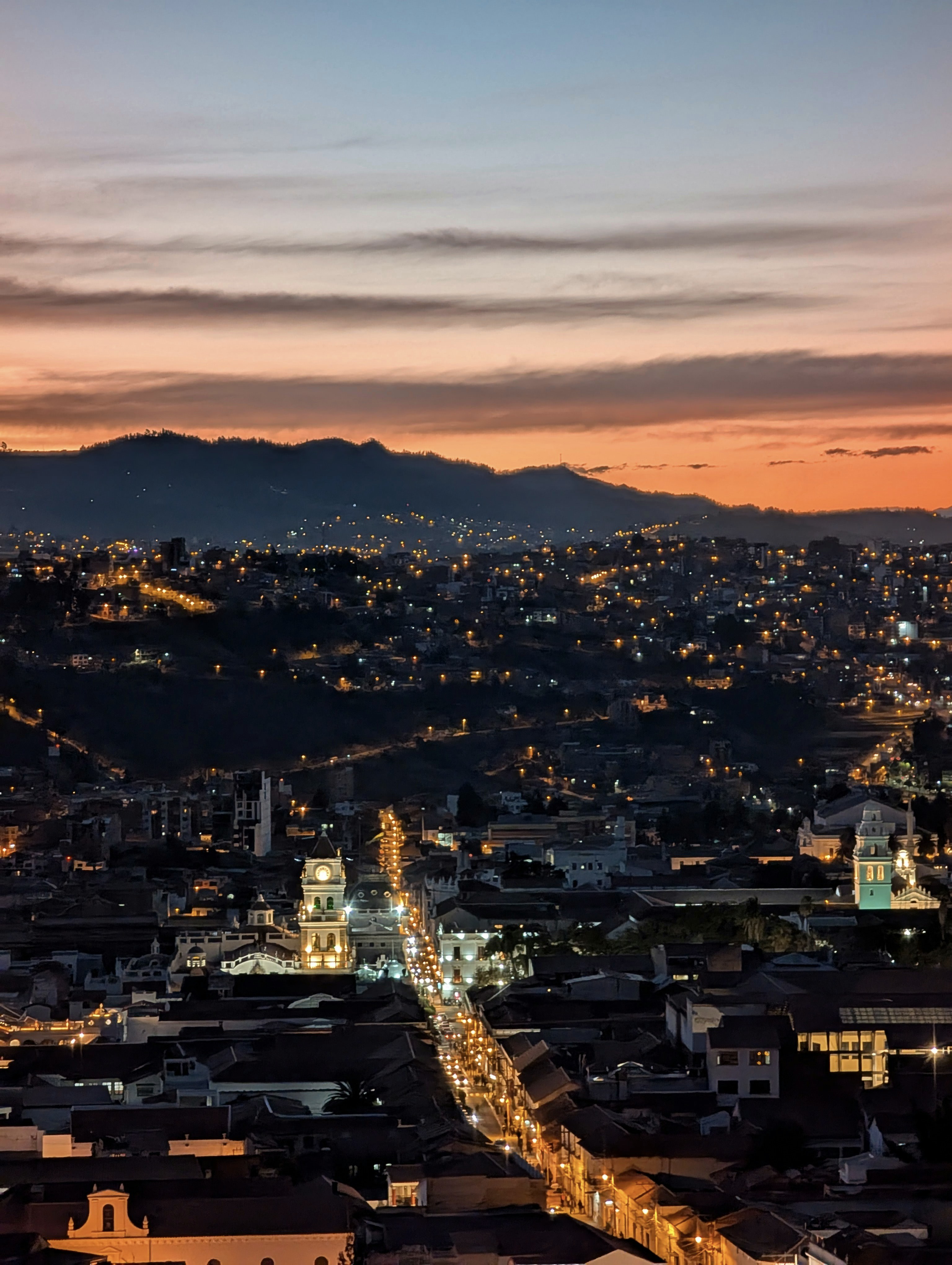 City lights and mountains at dusk