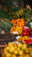 A colorful assortment of fresh tropical fruits at a market.