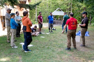 Group of people gathered in a circle outdoors