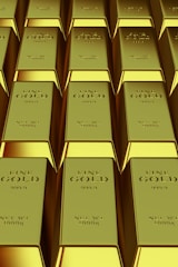 Rows of shiny gold bars stacked neatly