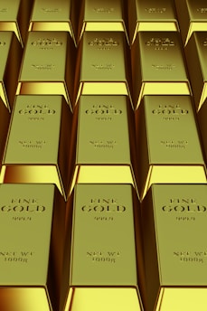 Rows of shiny gold bars stacked neatly