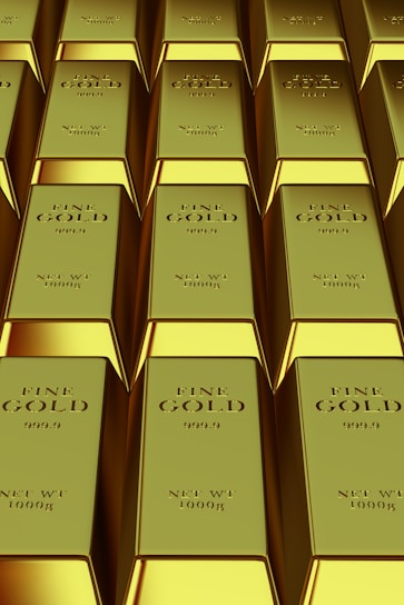 Rows of shiny gold bars stacked neatly