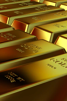 Rows of shiny gold bars stacked neatly