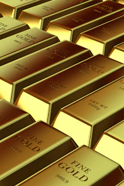 Rows of shiny gold bars stacked neatly
