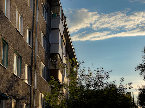 Apartment building exterior — placeholder photo, replace with actual report cover