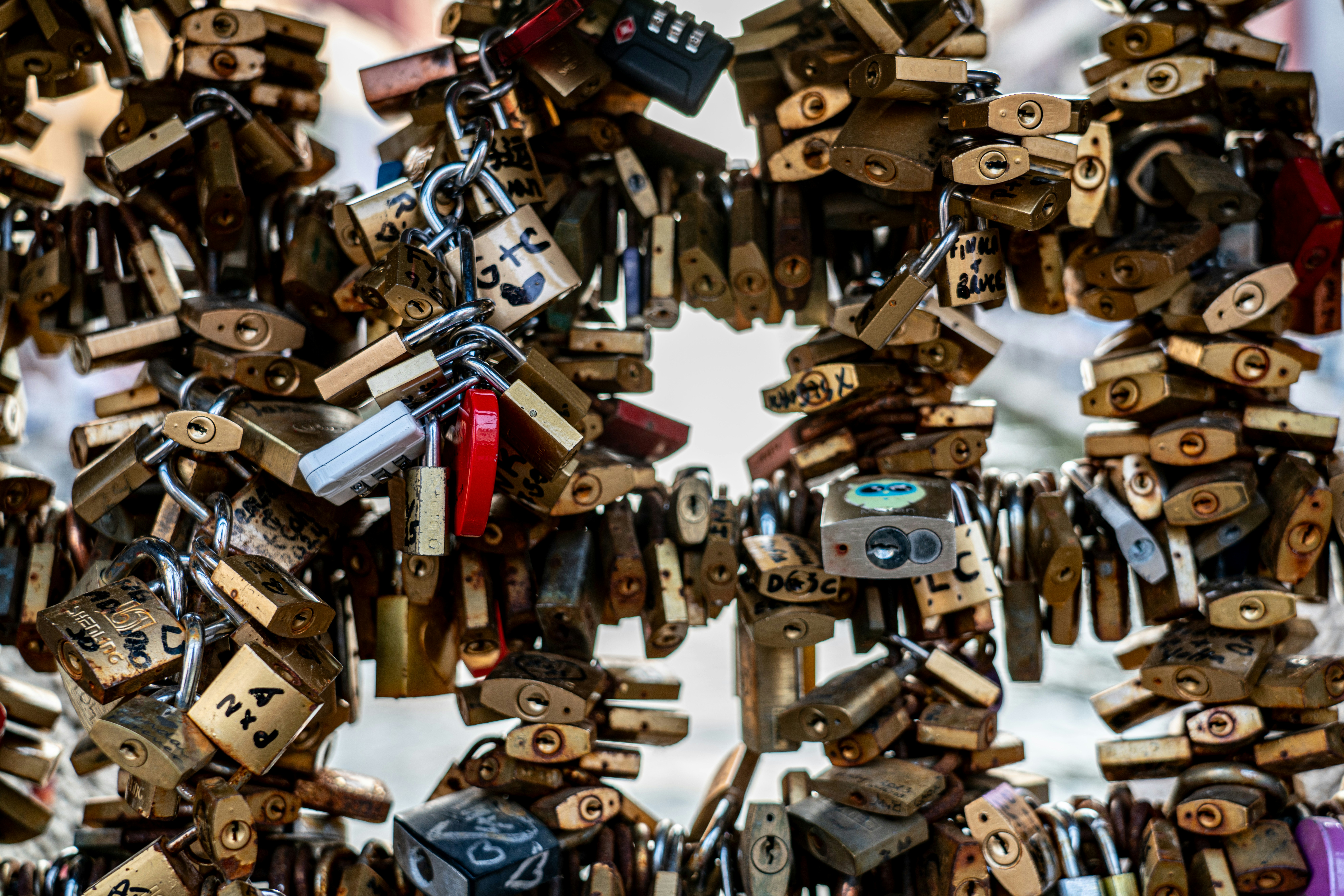 Many love locks attached to a railing