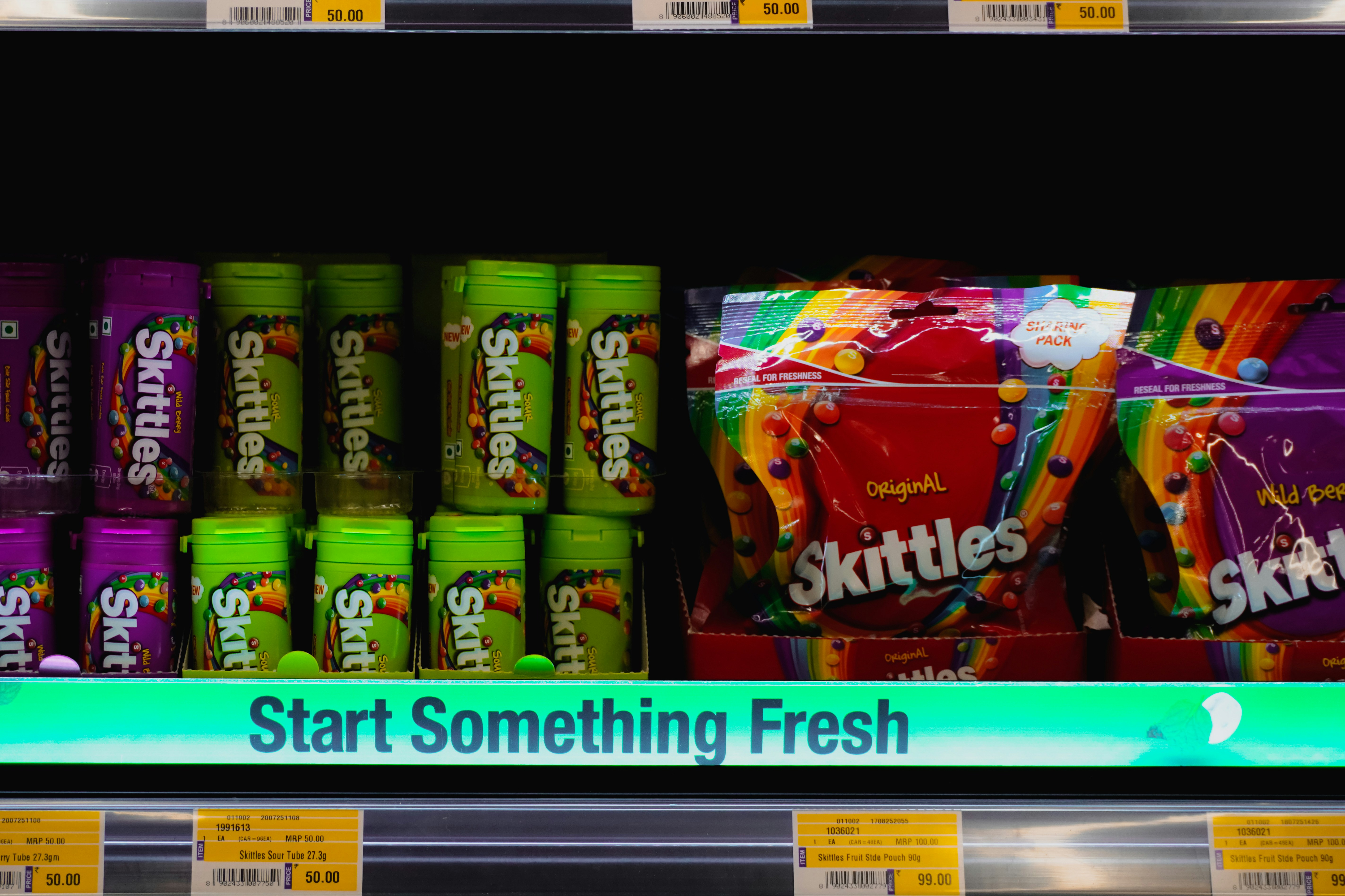 Skittles candy displayed on store shelves