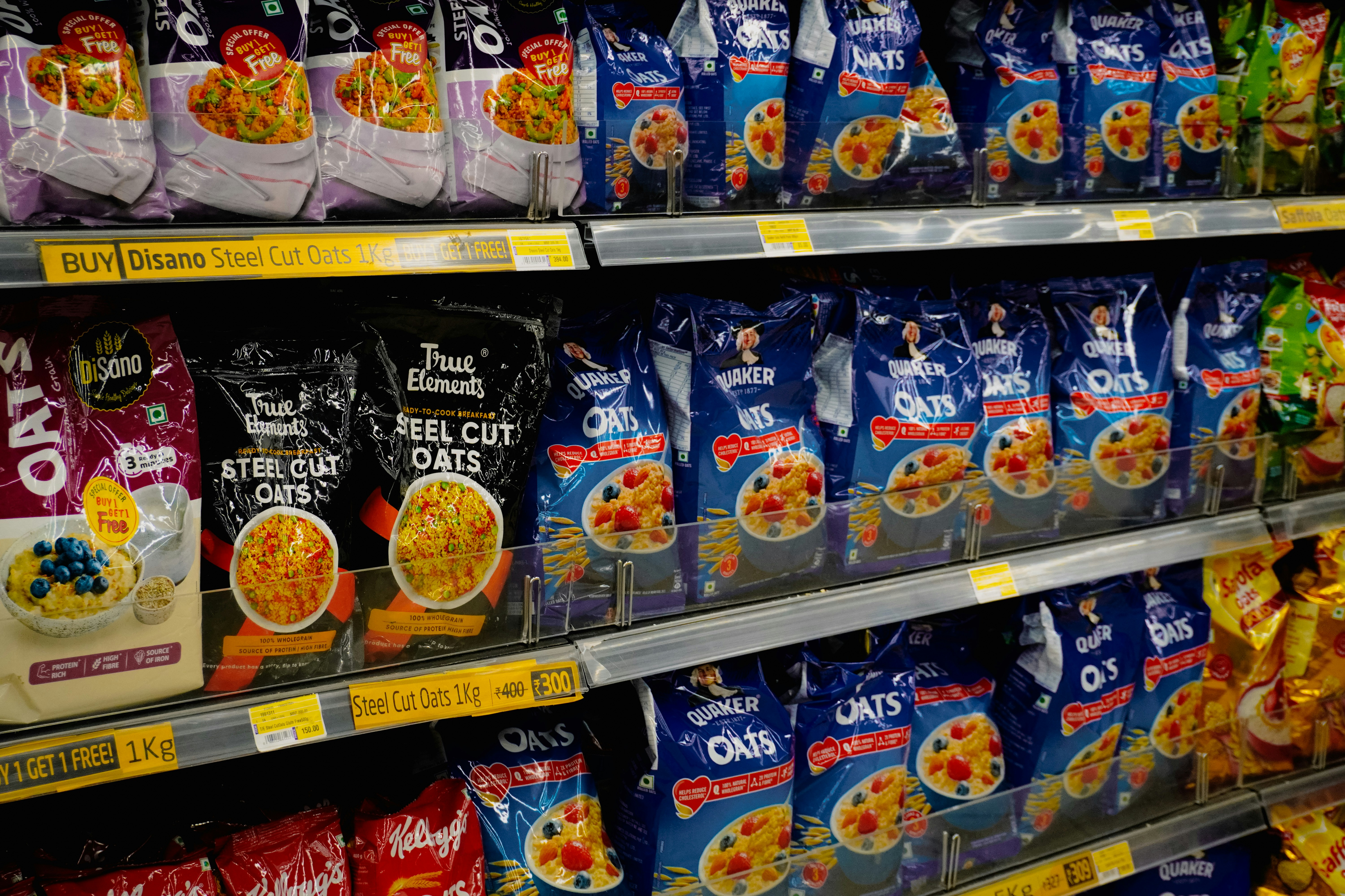 Shelves of packaged oatmeal and cereal in a store (Photo by Adhitya Sibikumar on Unsplash)