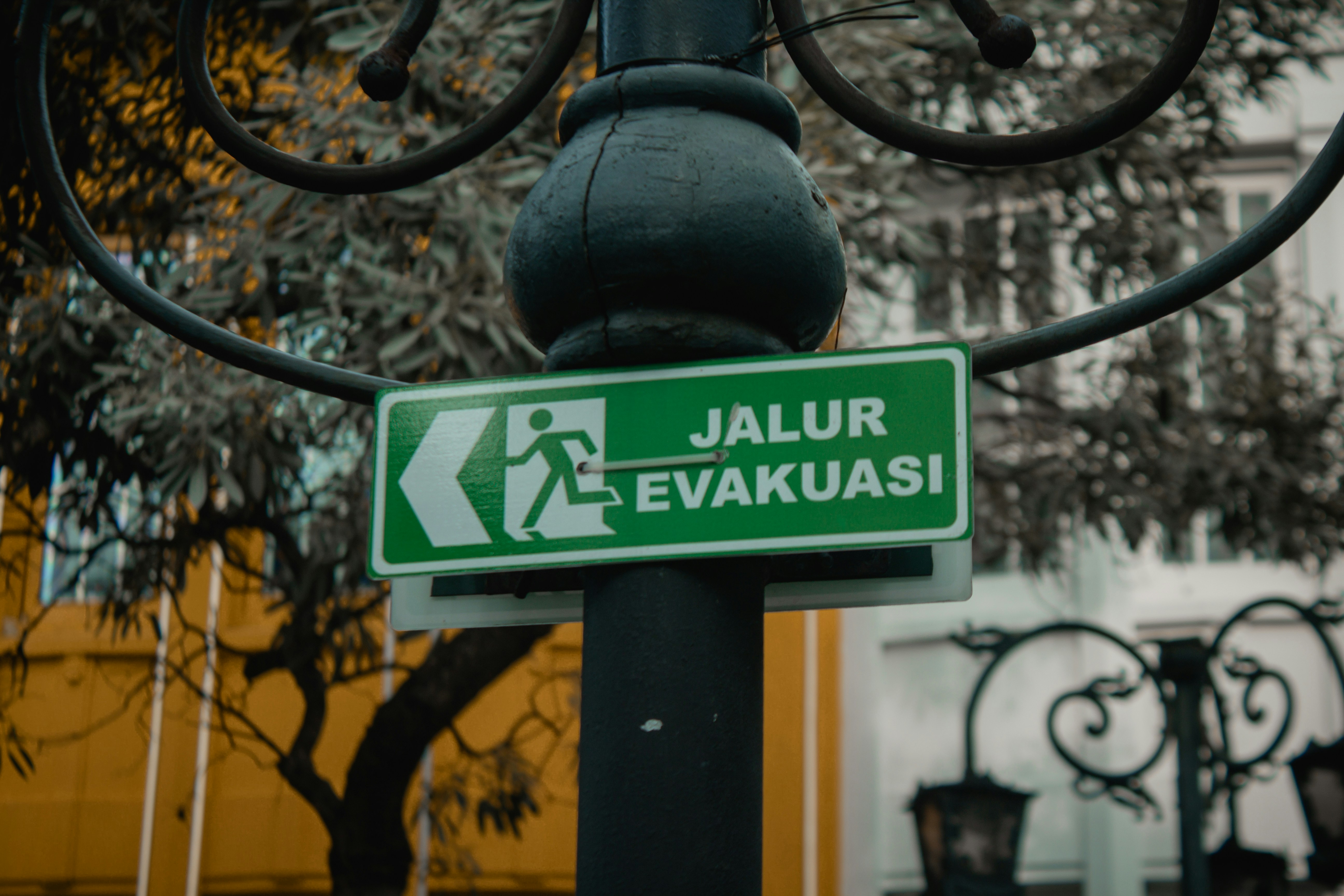 A bright green rectangular sign reading \