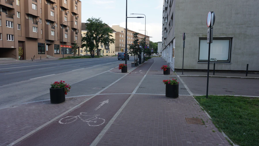 A city street with a bike lane and neighborhood buildings