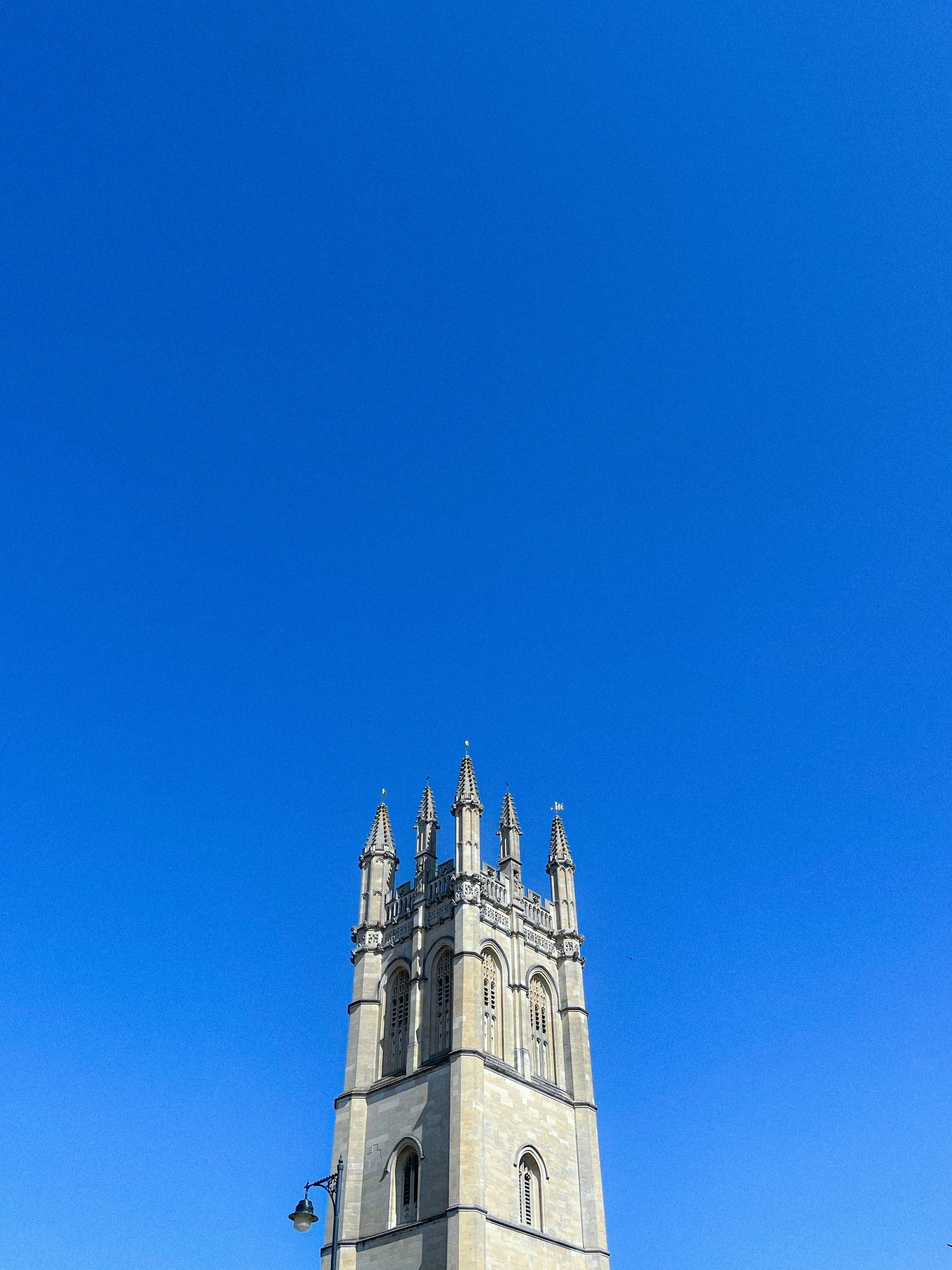Stone tower against a clear blue sky