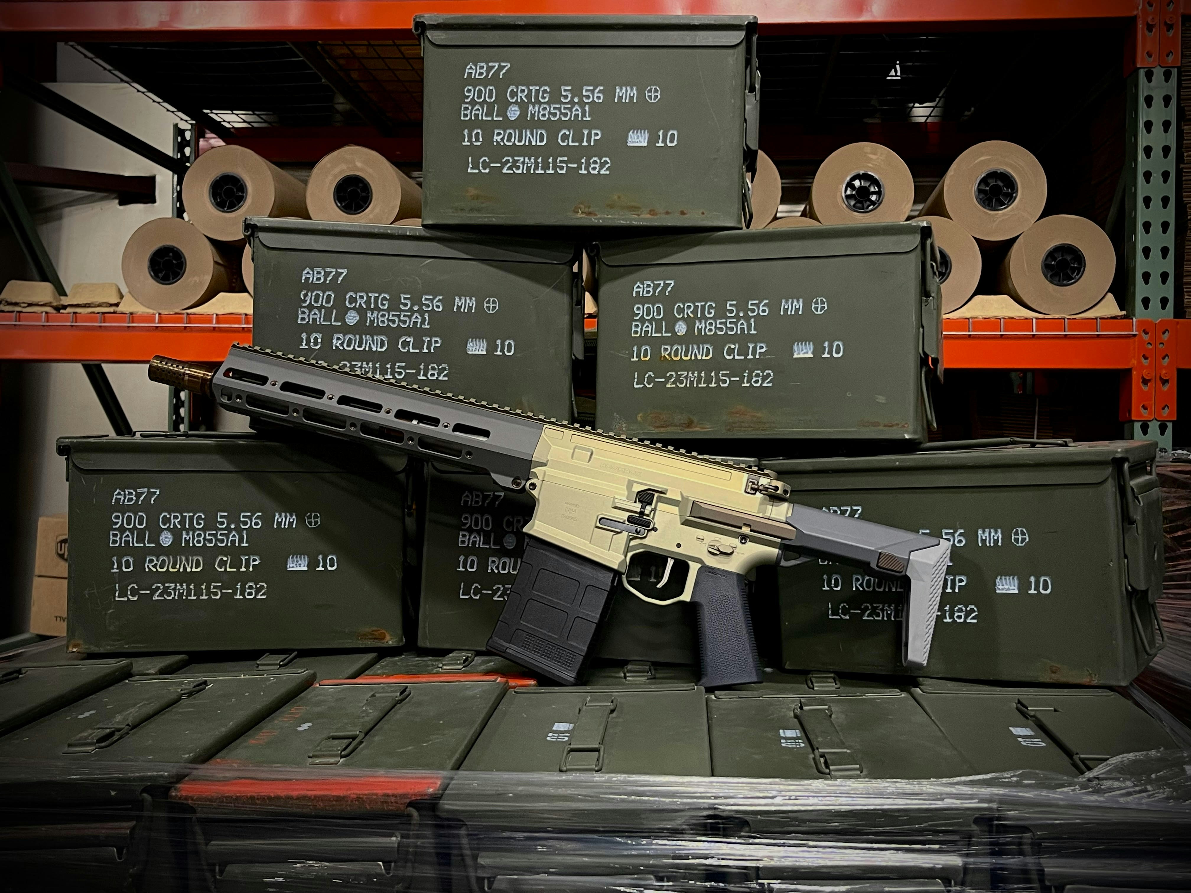 Rifle resting on stacked ammunition crates