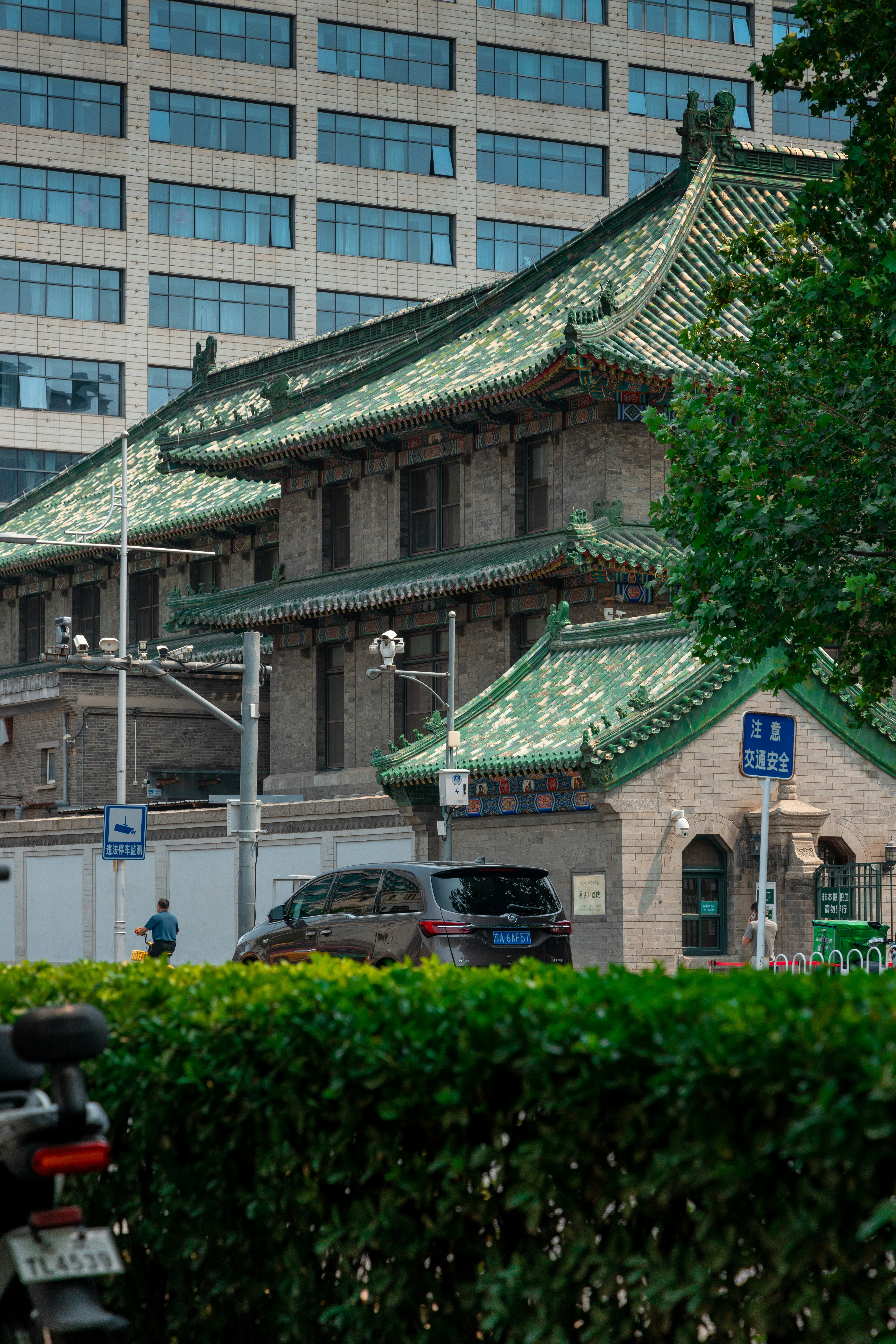 Traditional chinese architecture beside modern building