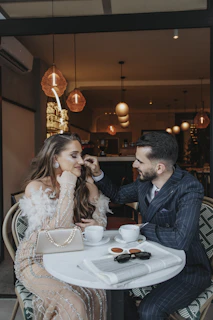 Couple enjoying coffee at an outdoor cafeService Becomes Luxury When It Feels Personal