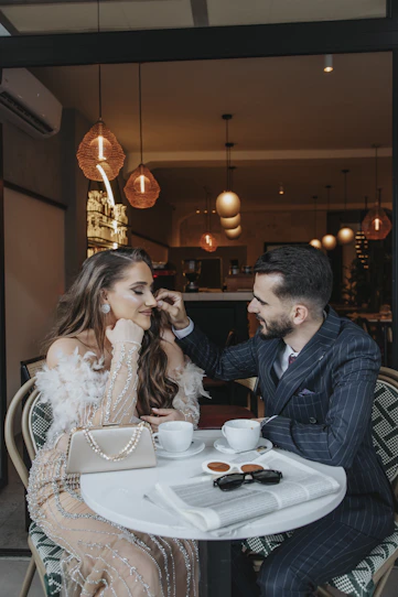 Couple enjoying coffee at an outdoor cafeService Becomes Luxury When It Feels Personal