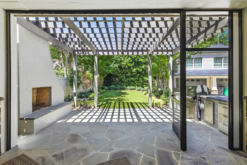 Pergola, fireplace and outdoor kitchen