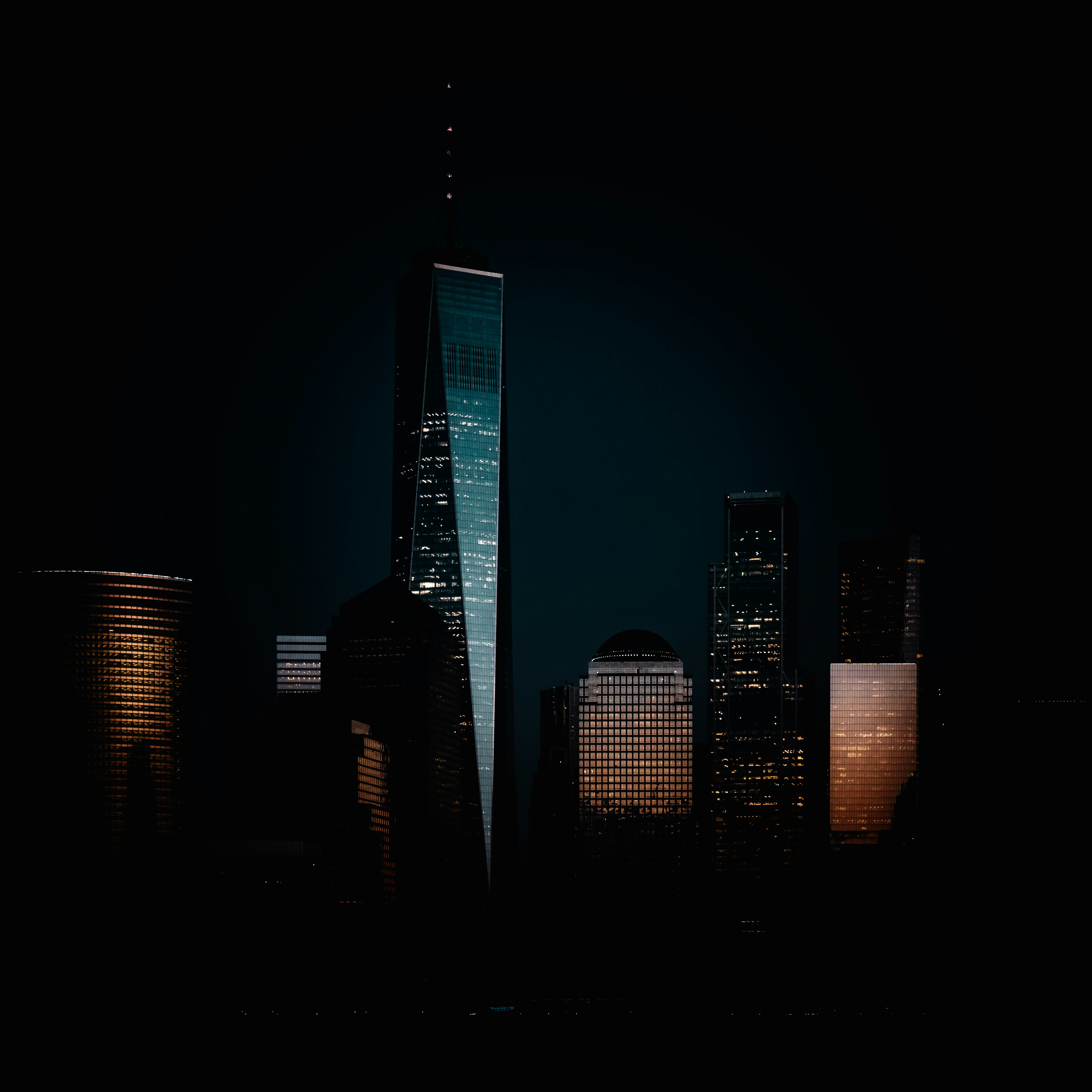 Cityscape with illuminated skyscrapers at night