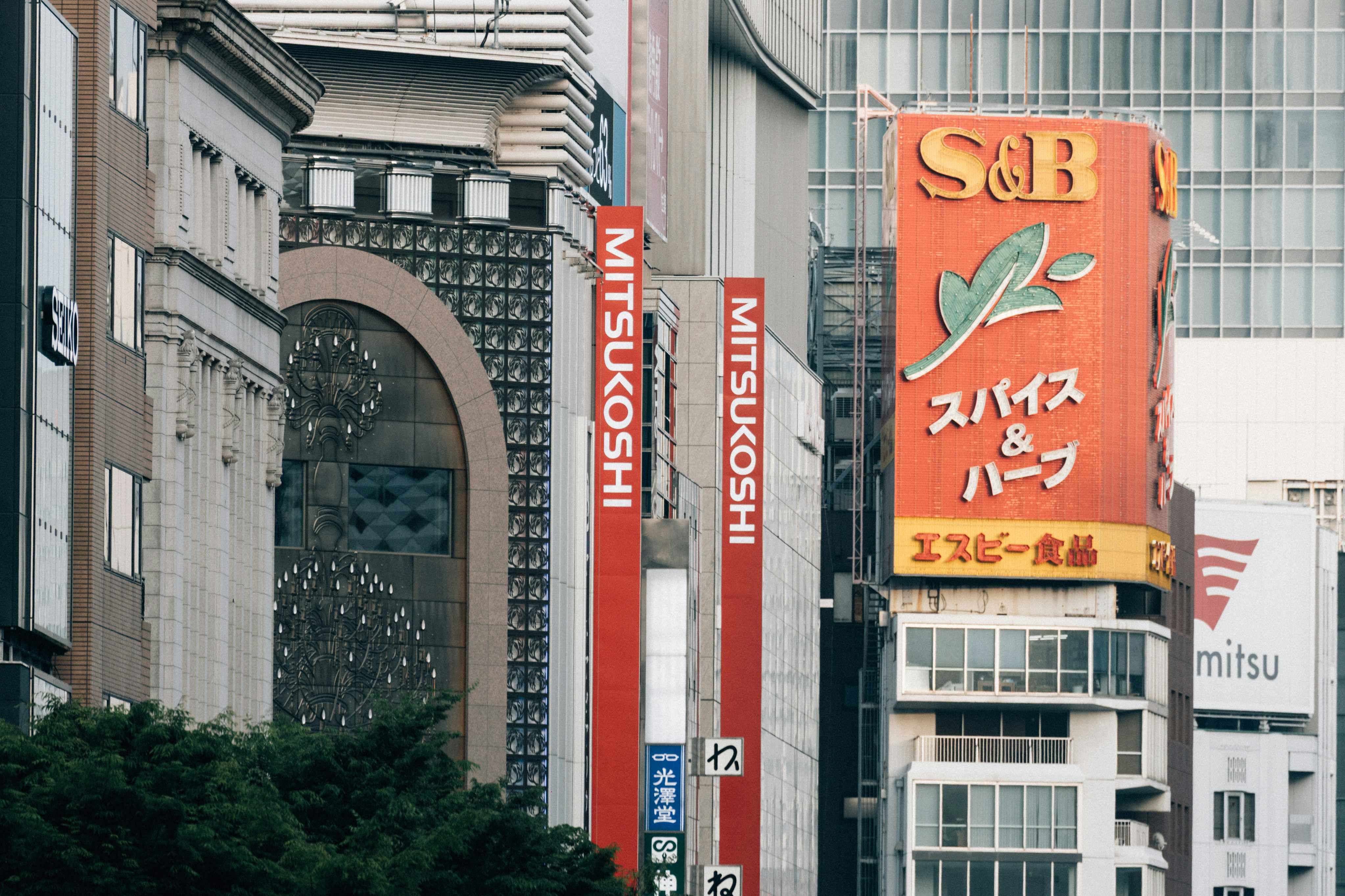 SBI Shinsei Bank branch exterior with orange and green logo