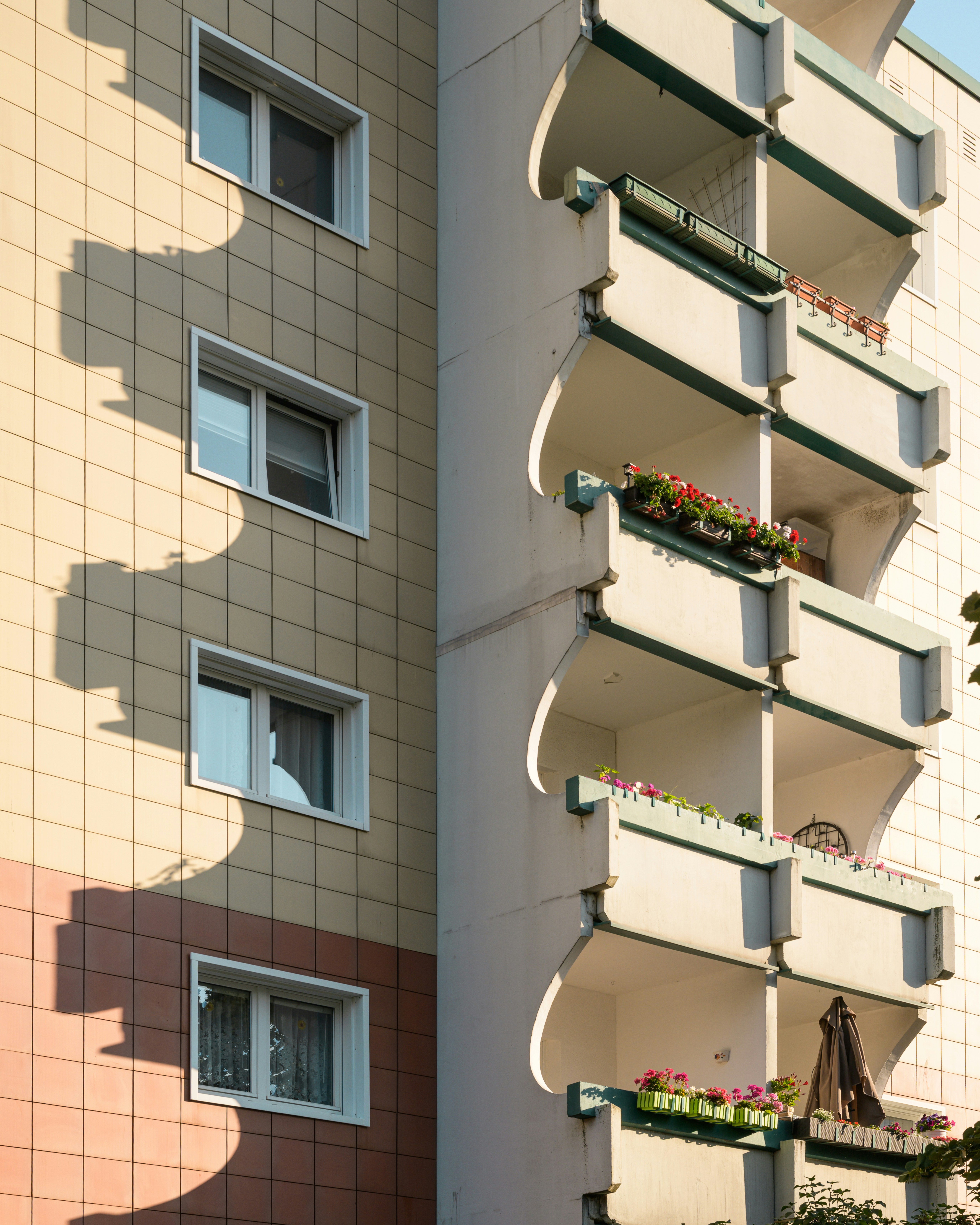 Modern apartment building with balconies and windows