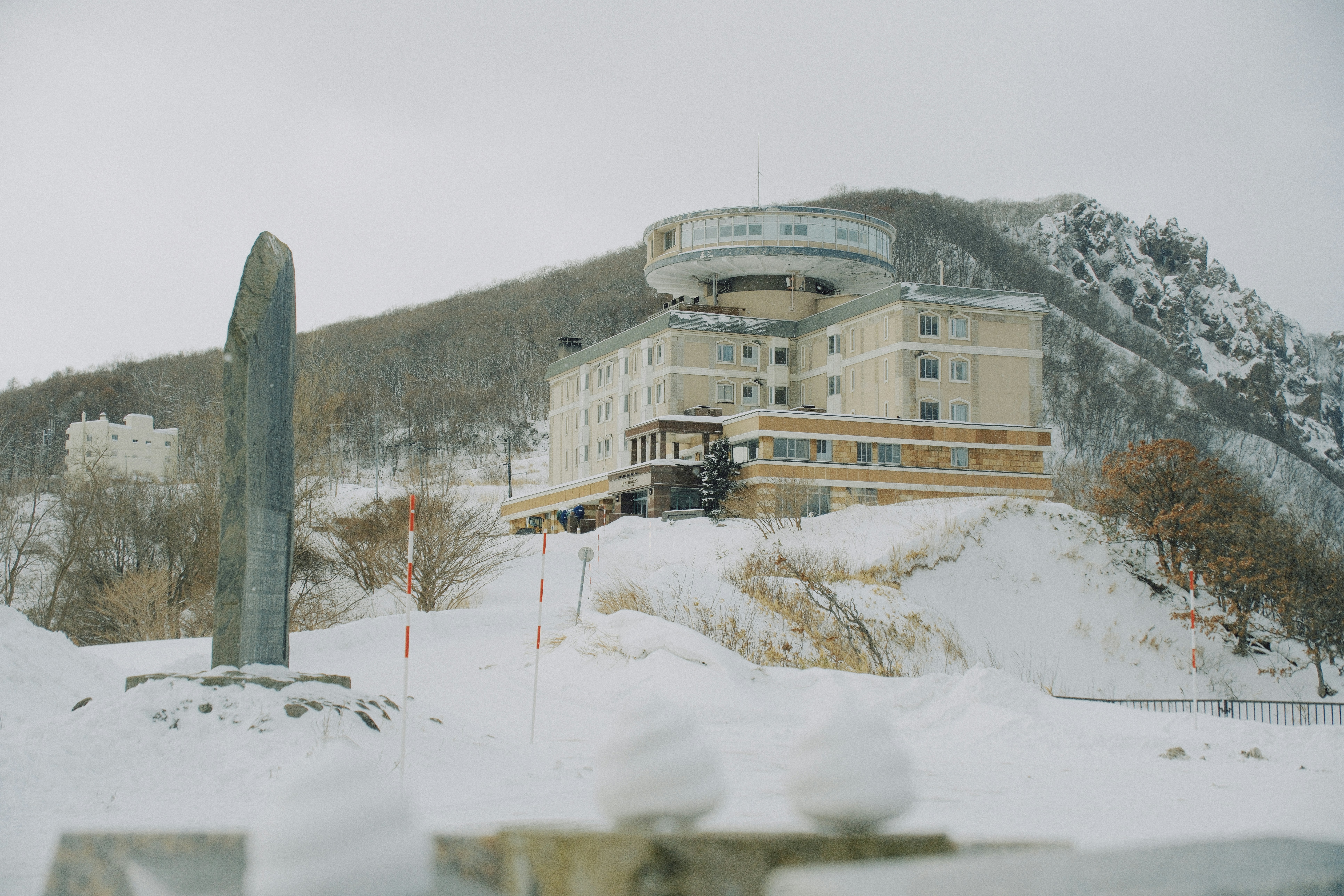 Naeba ski resort slopes with large hotel in background winter