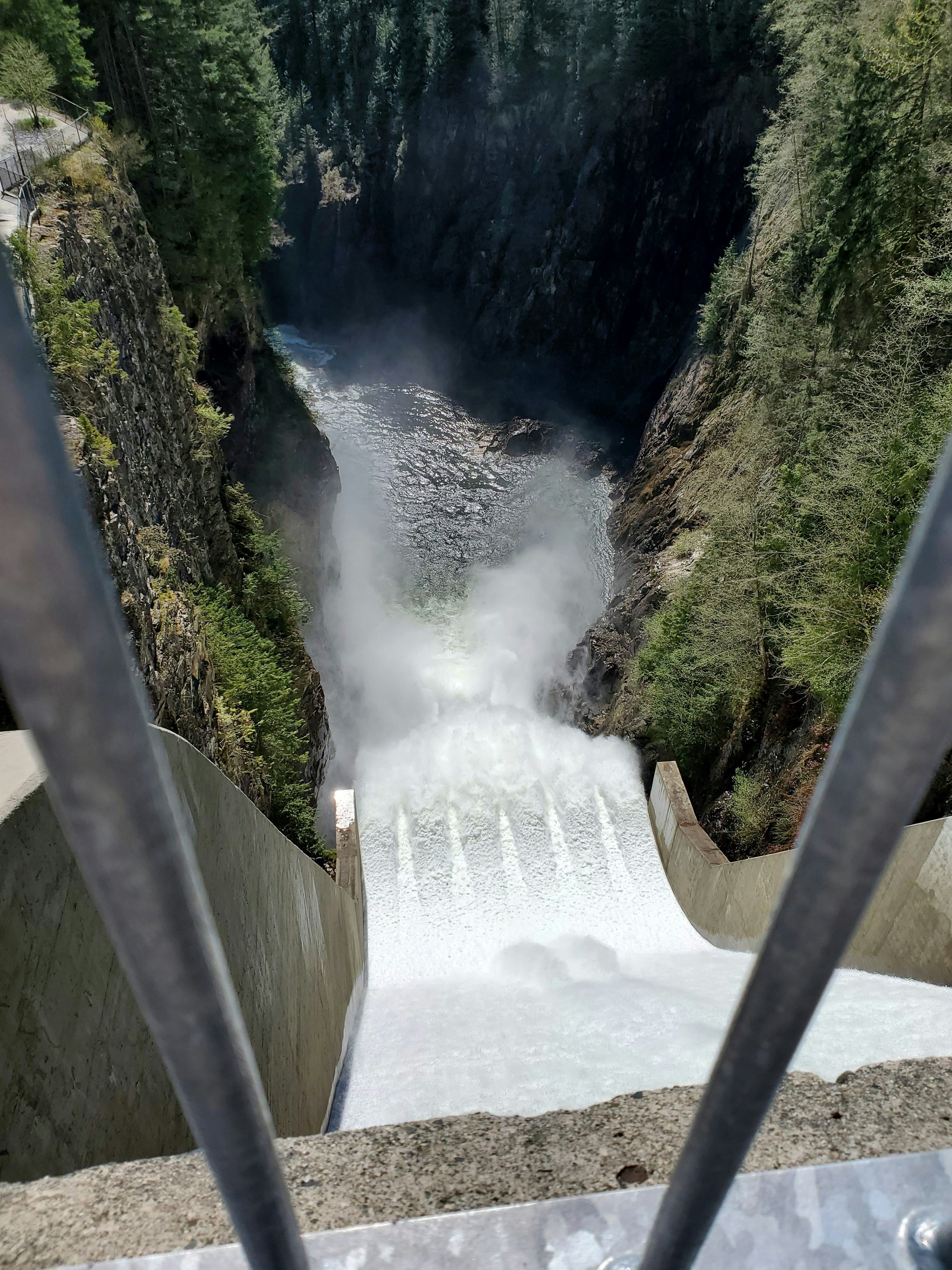 Powerful waterfall cascading down a rocky gorge