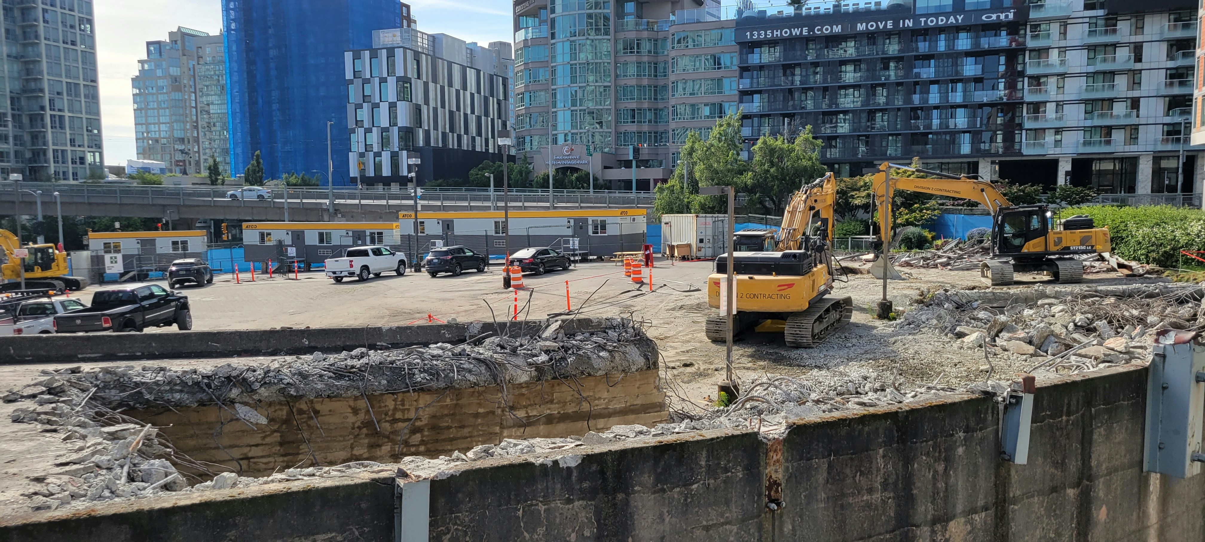 Construction site with excavators and trucks