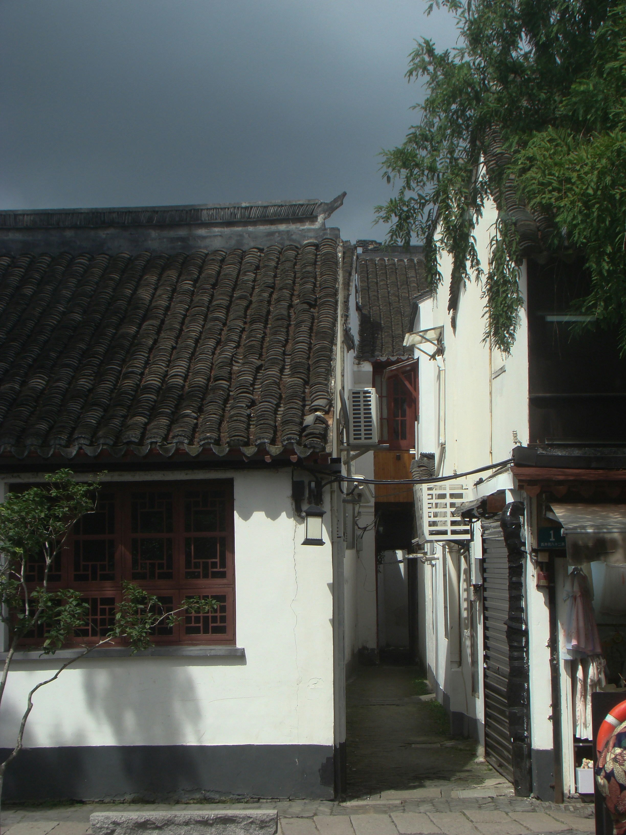 Narrow alleyway between traditional buildings