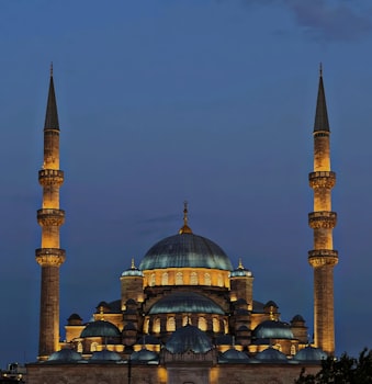 Sheikh Zayed Grand Mosque at dusk, representing spiritual travel