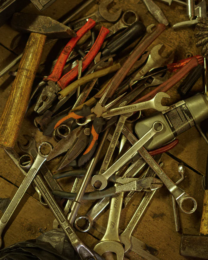 Assorted hand tools used for basic home appliance repair