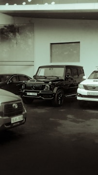 Several cars parked in front of a building