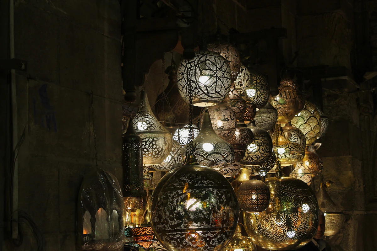 Ornate lanterns glowing at night during a festive celebration