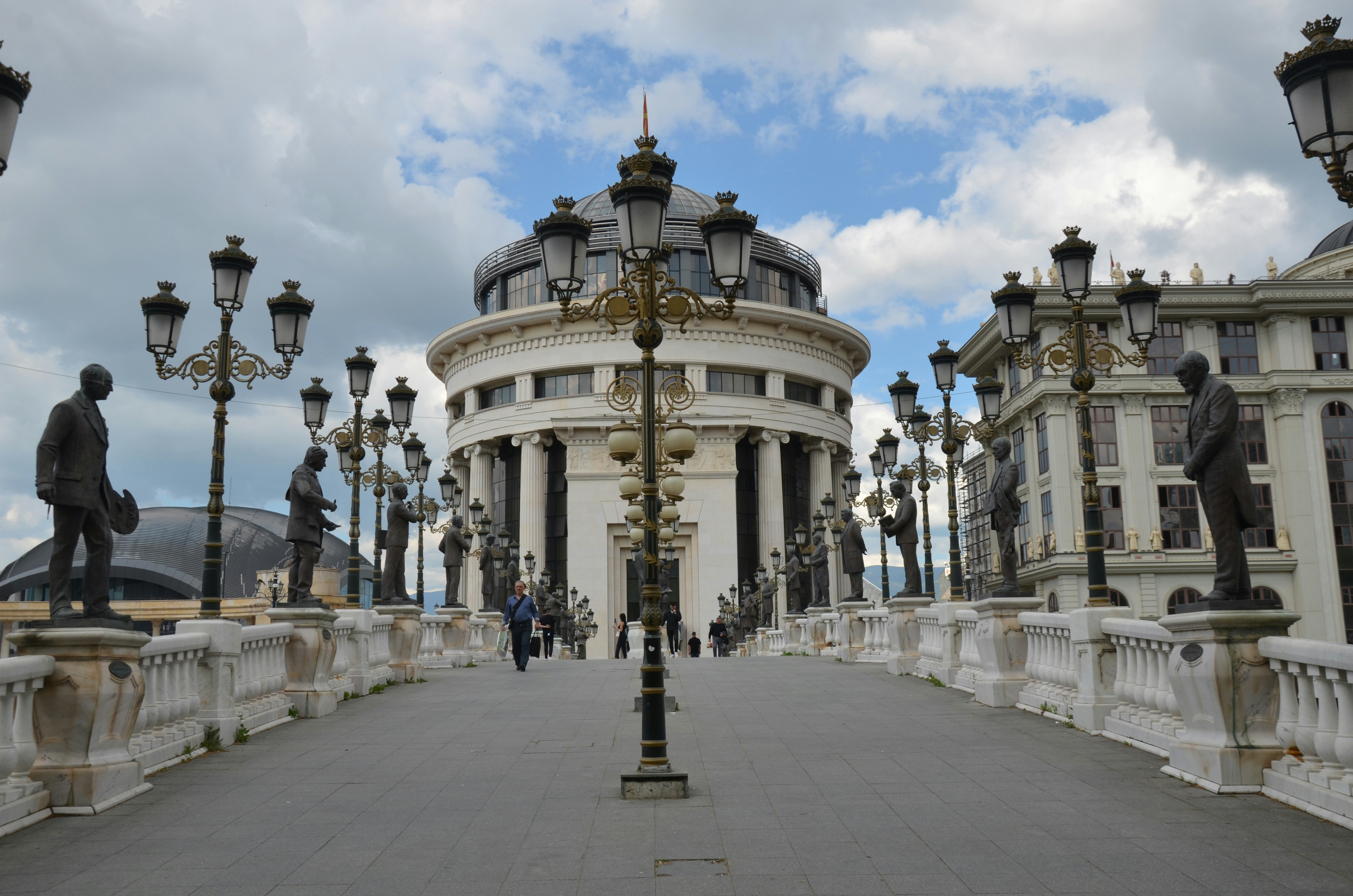 Bridge with statues and ornate building