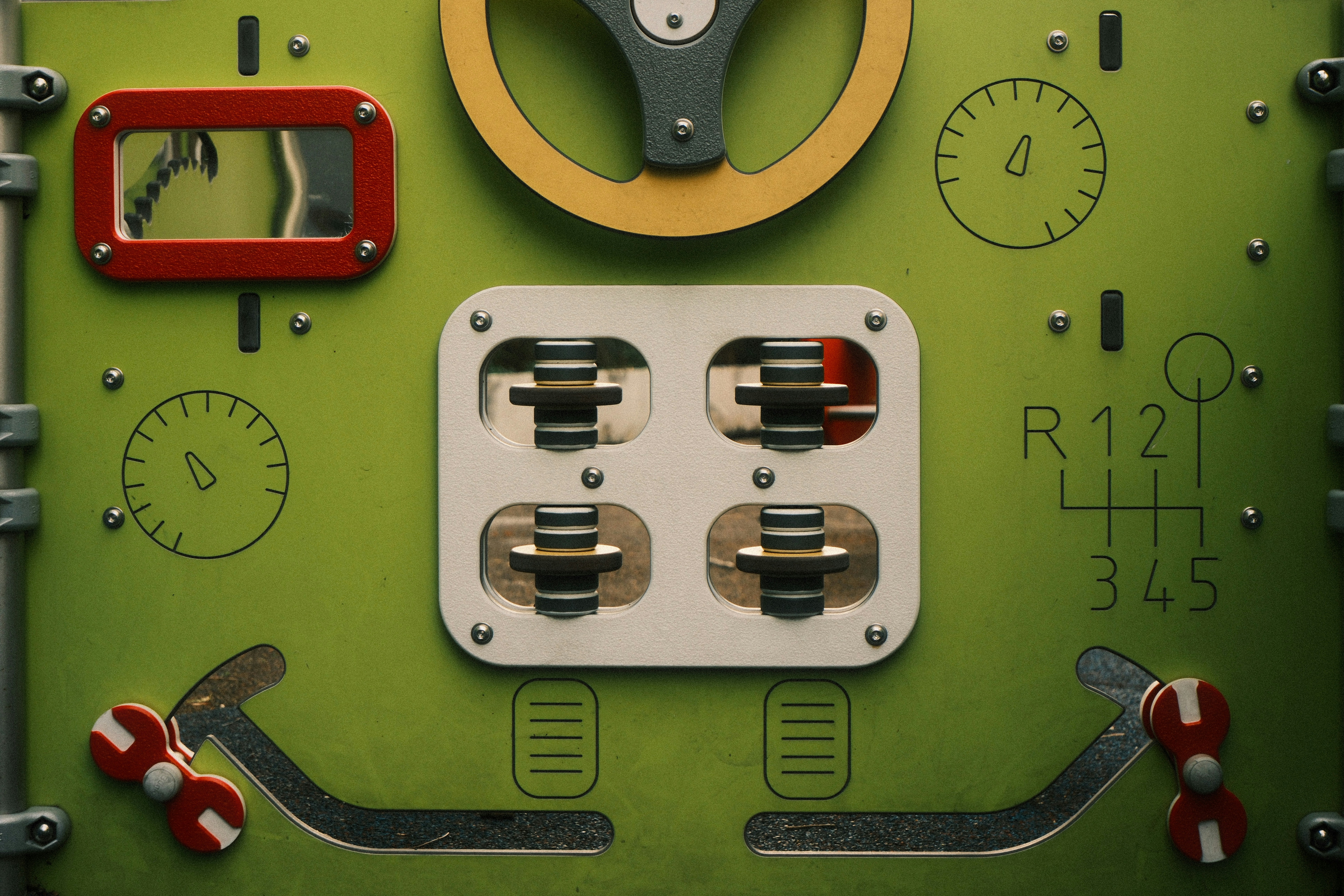 Green control panel with levers and dials