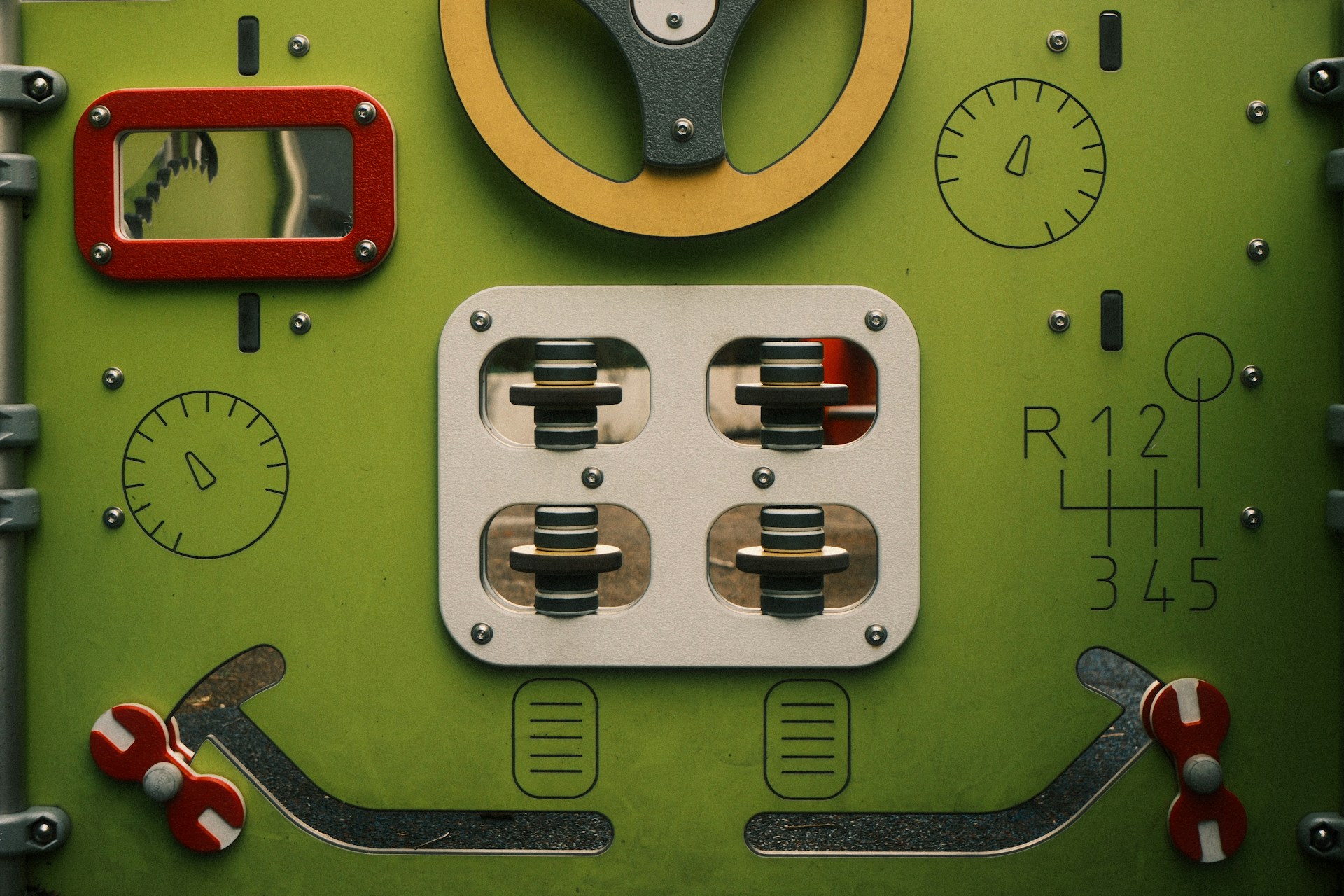 Green control panel with levers and dials