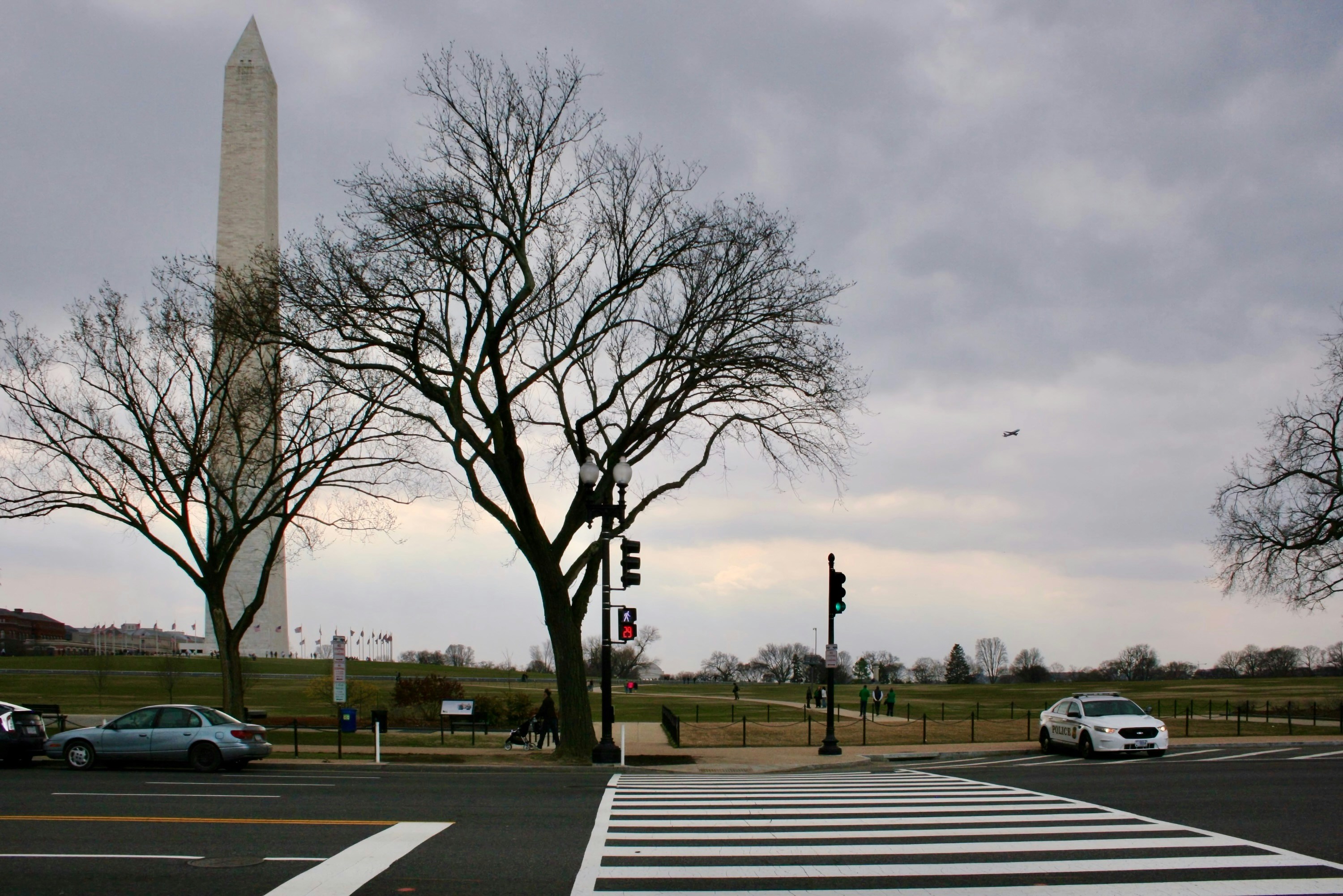 Washington monument viewed from a street corner.