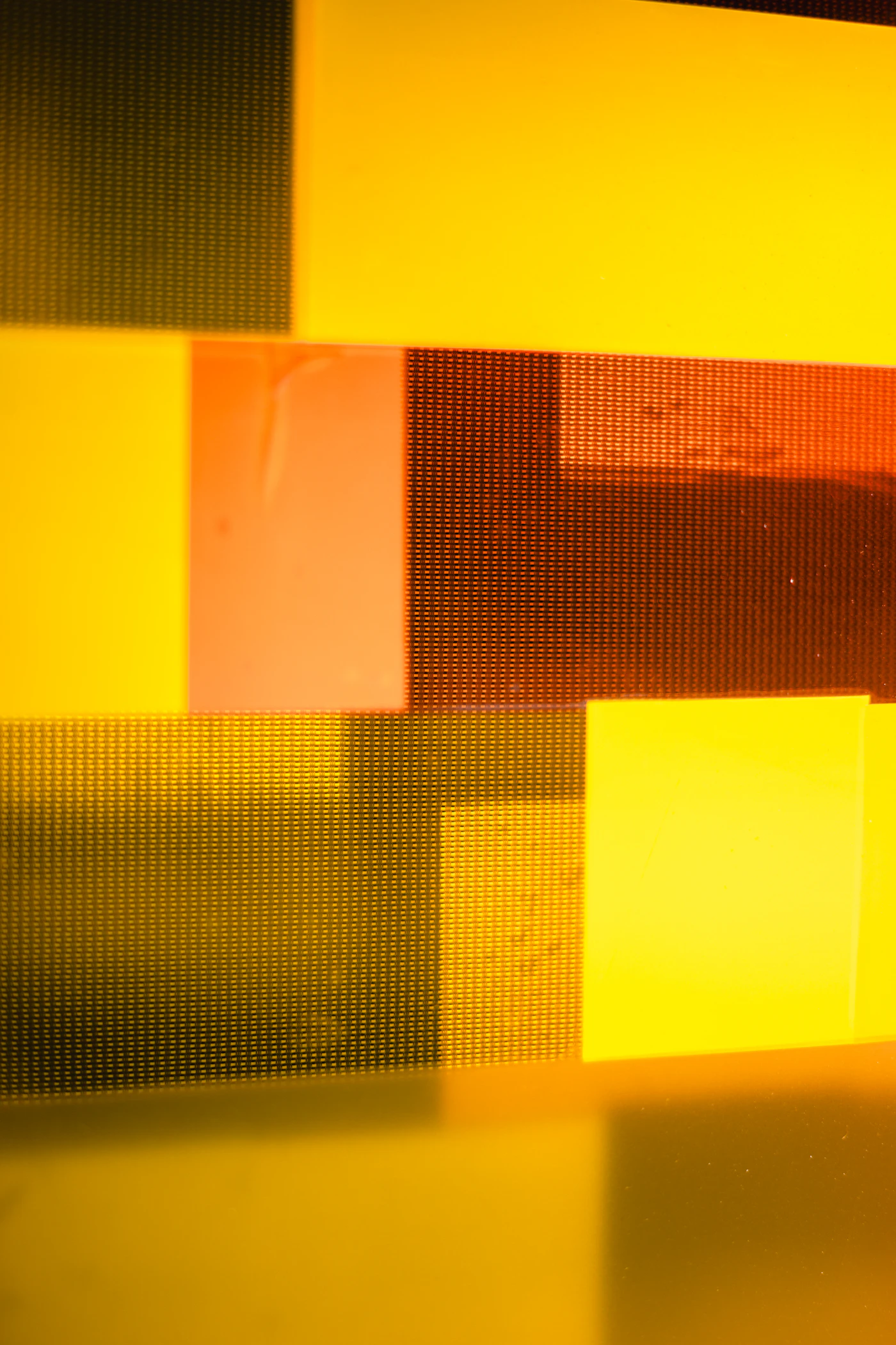 Abstract geometric shapes with warm yellow and orange hues: Solaire solar energy brand identity