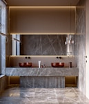 Modern bathroom with marble vanity and double sinks