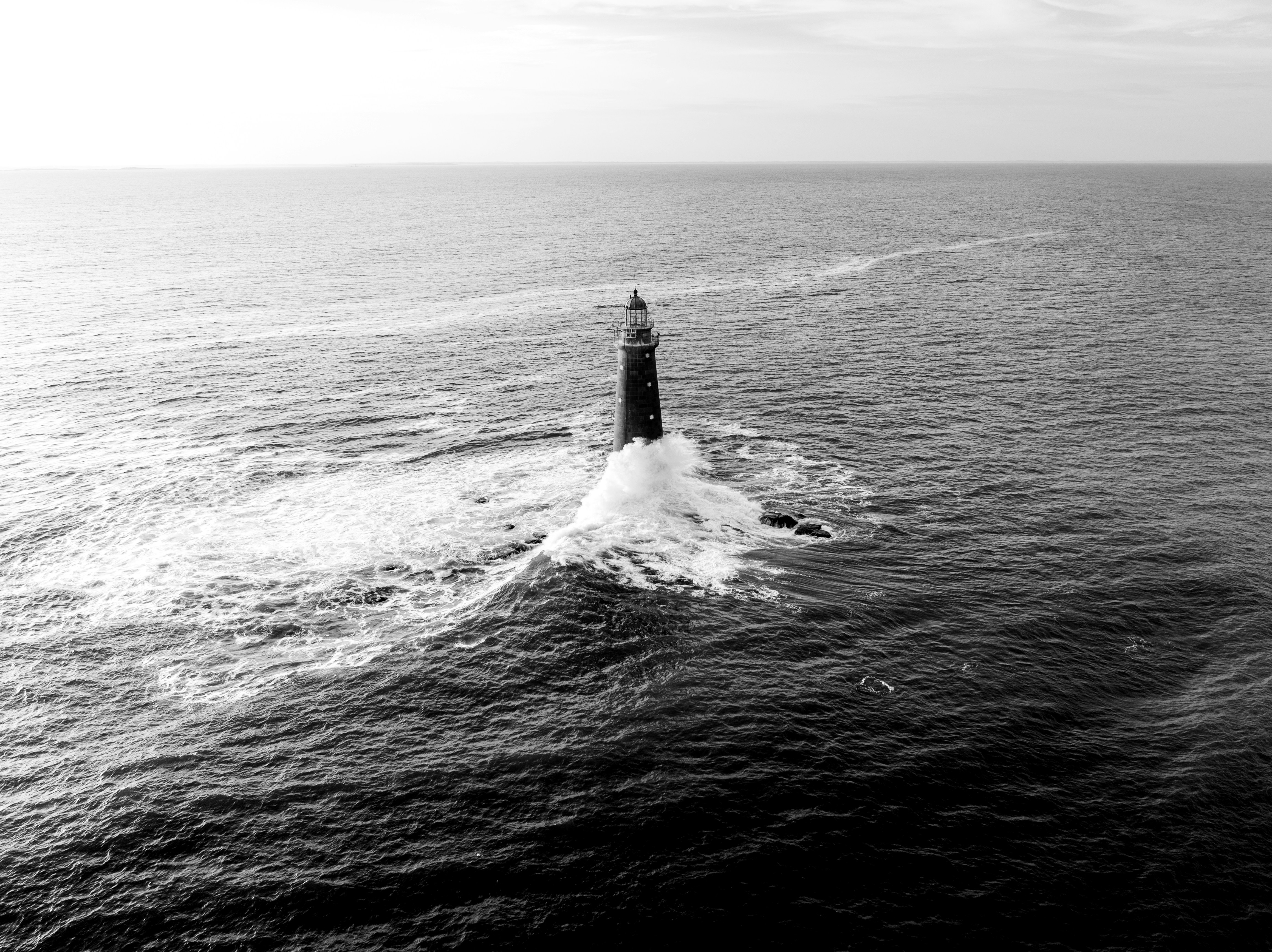 Submarine surfacing through rough ocean waves