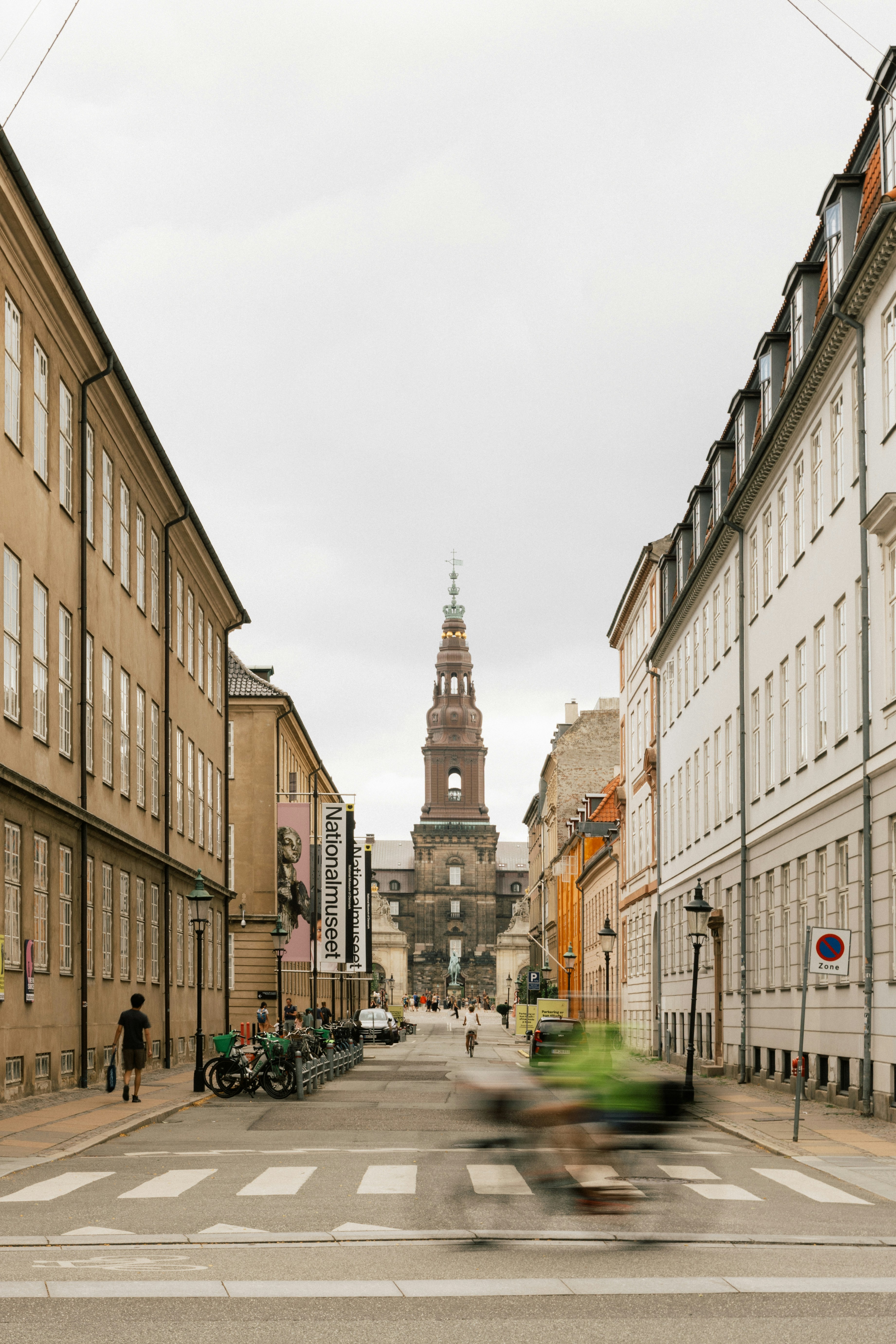 Street view leading to a large church tower