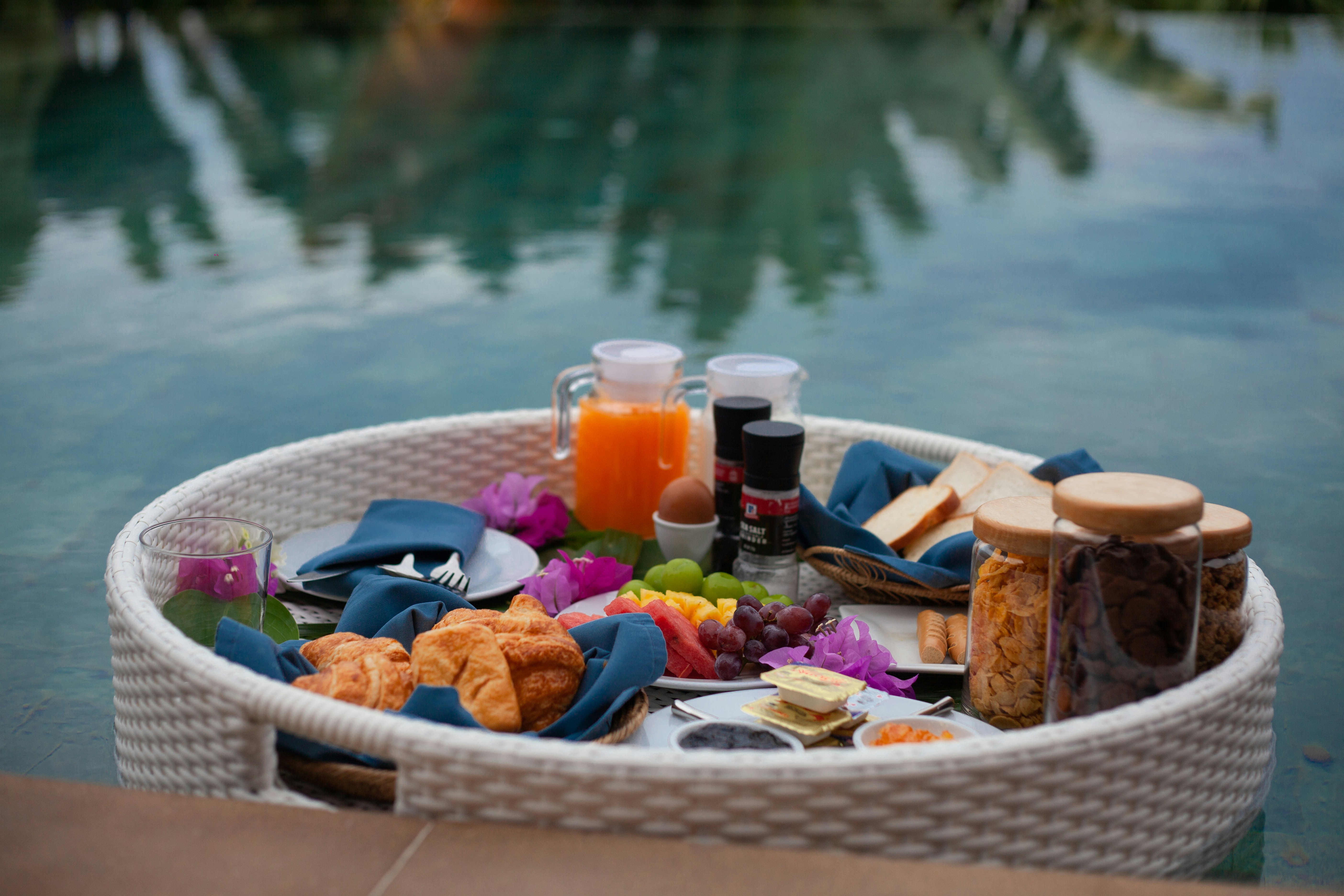Floating breakfast tray with croissants and fruit