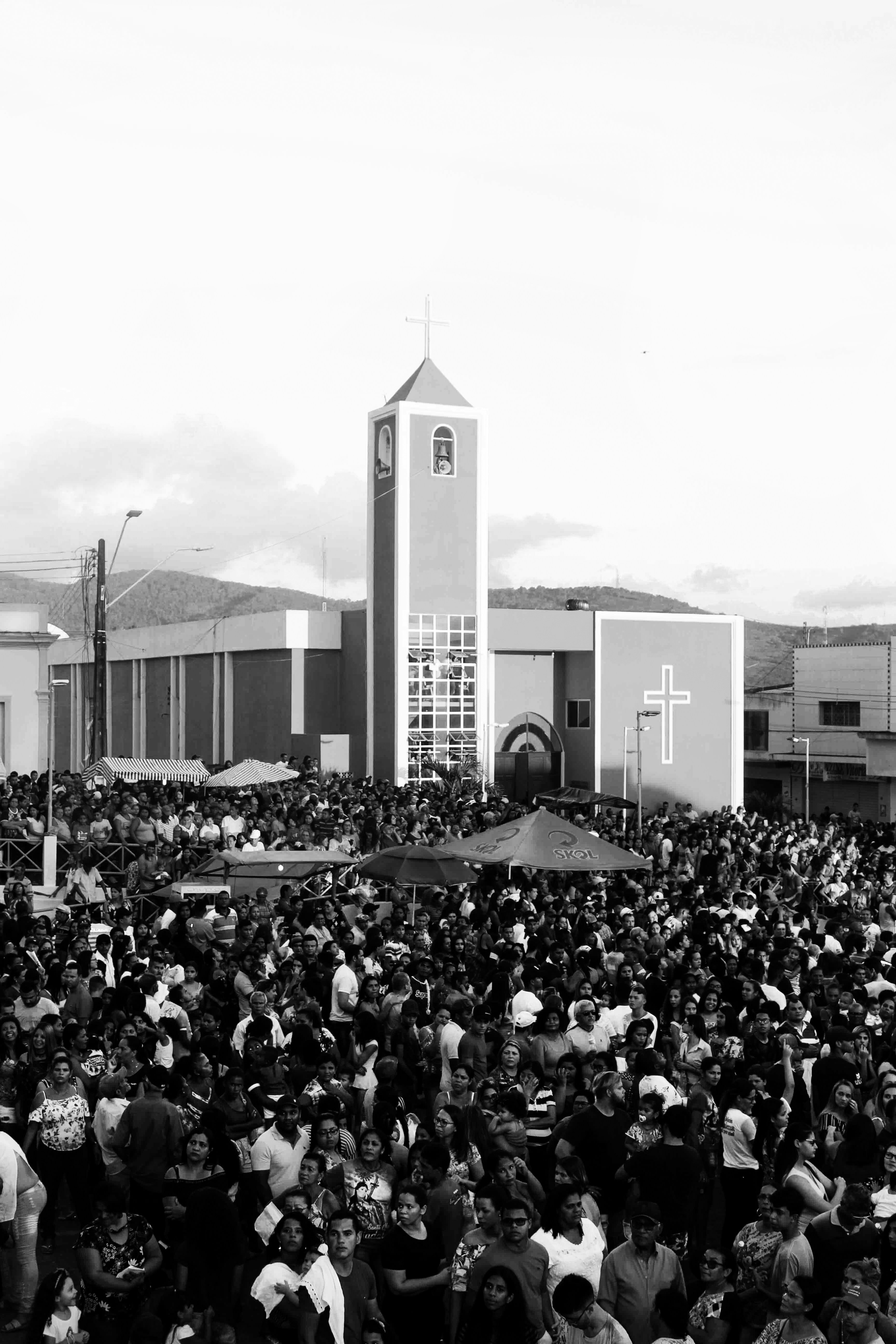 Crowd gathered in front of a church building