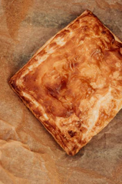 Golden brown pastry on parchment paper