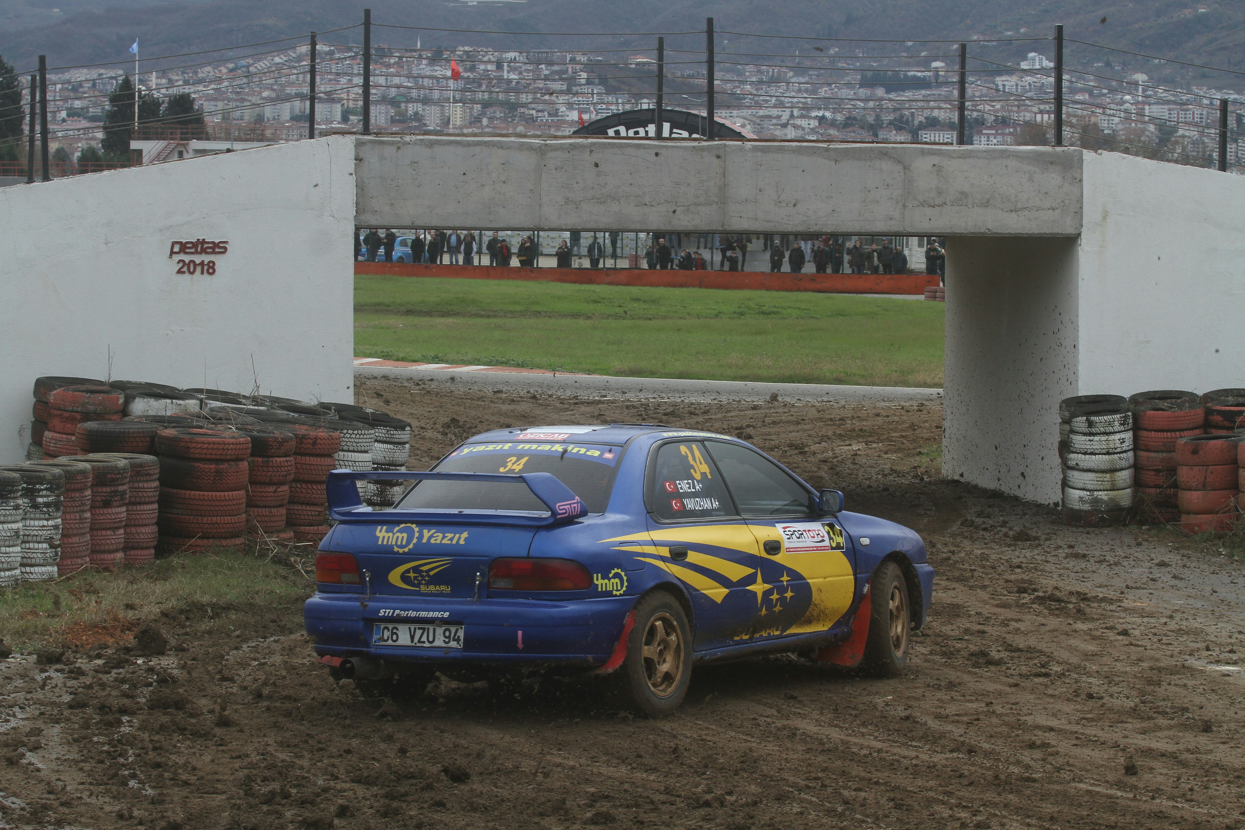 Blue rally car driving on a dirt track photo – Free Car Image on Unsplash
