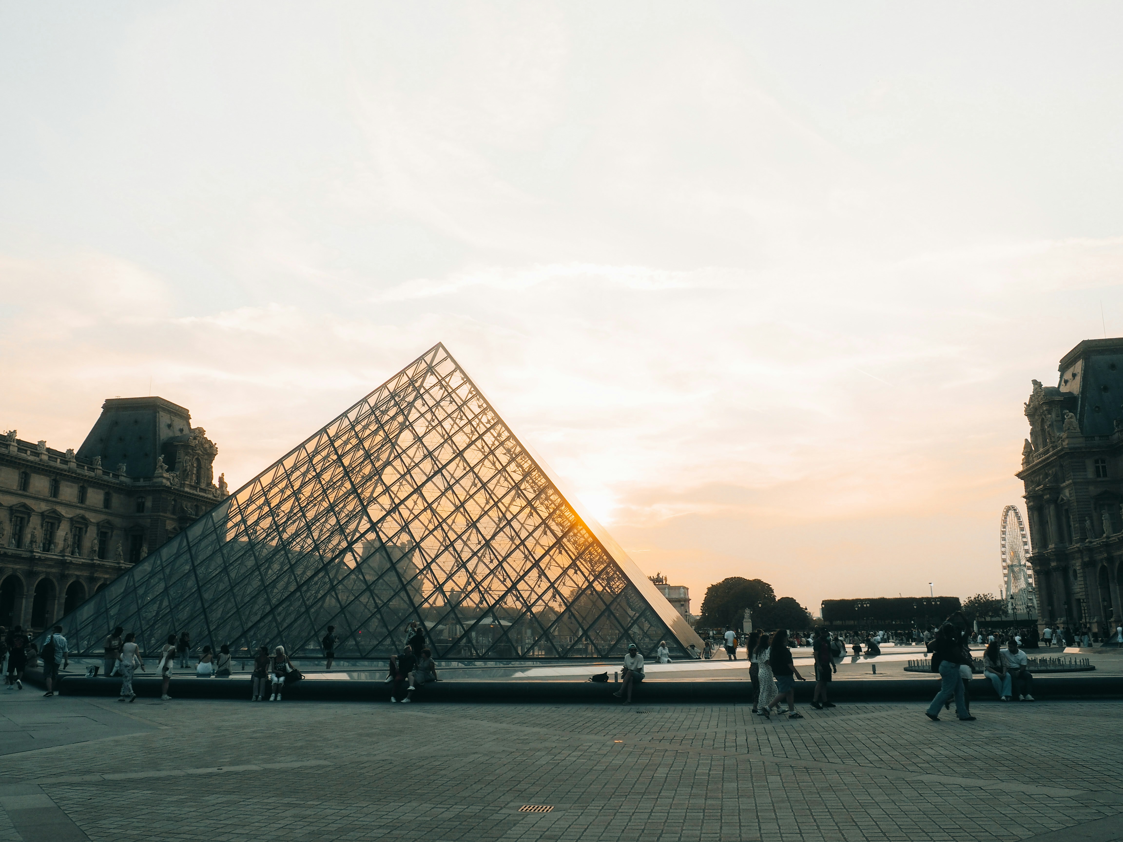Louvre Pyramid at dusk - things to do in paris