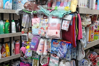 Shelves filled with various toiletries and cleaning products.